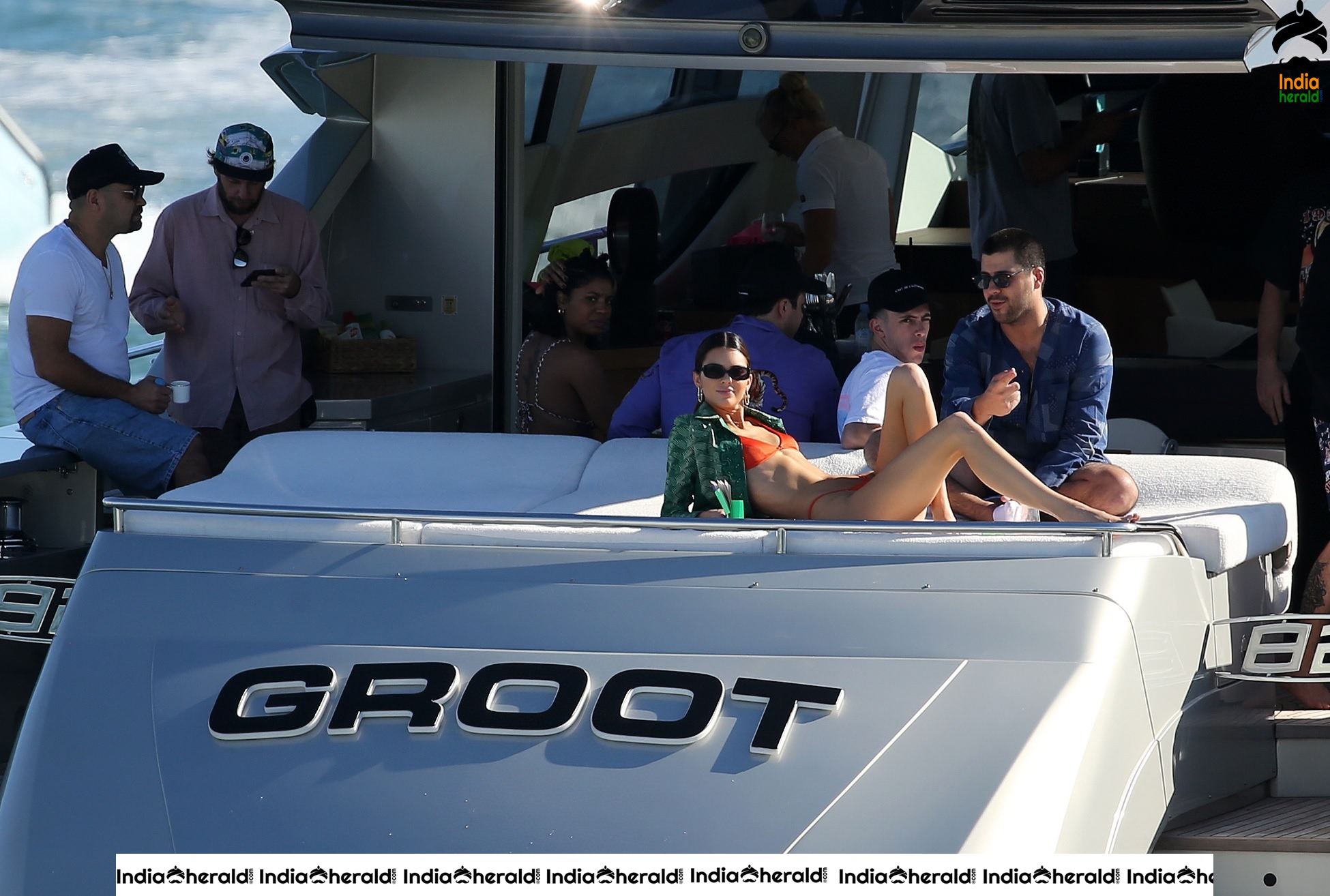 Kendall Jenner in Orange Bikini on a Yacht in Miami Set 1