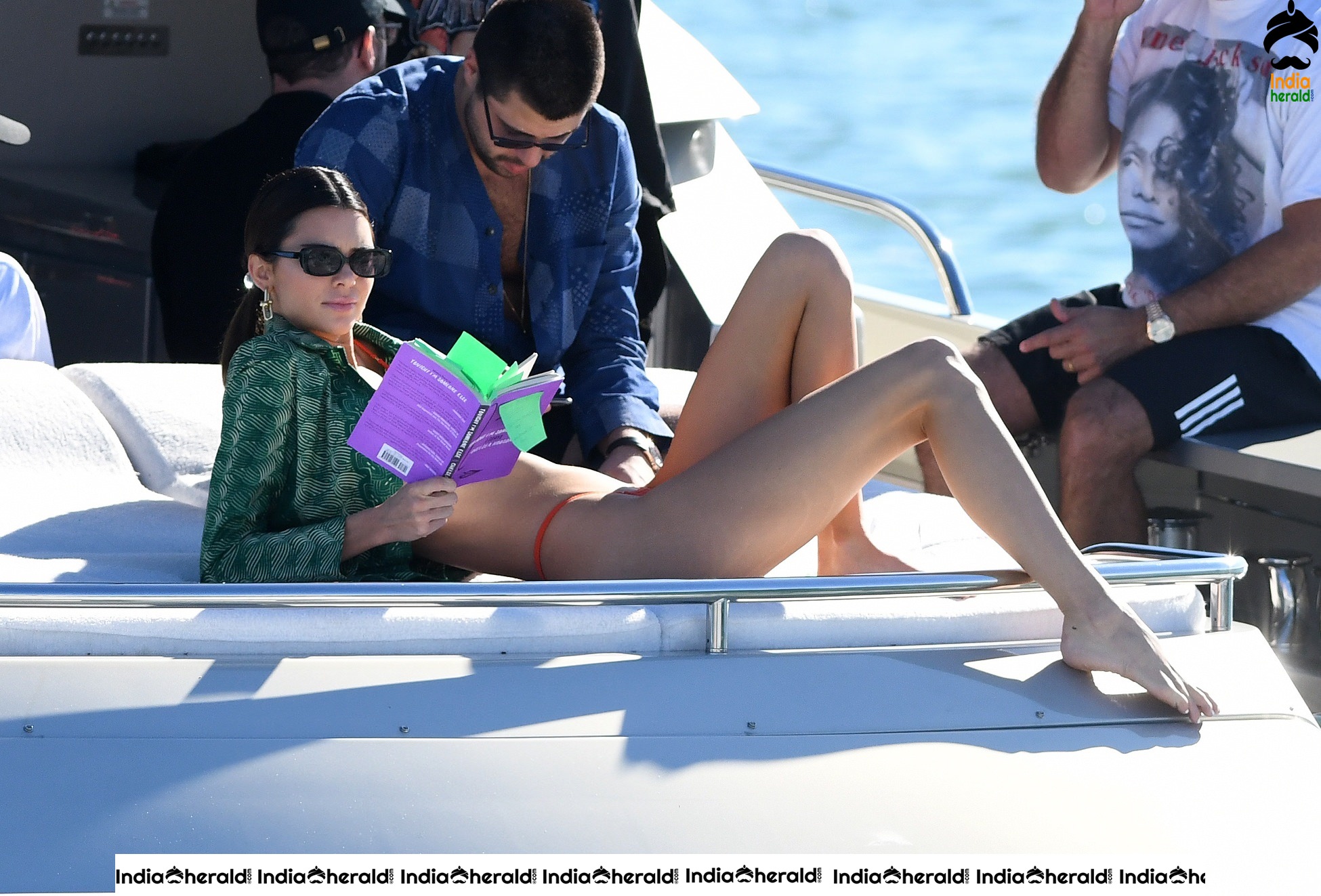 Kendall Jenner in Orange Bikini on a Yacht in Miami Set 1