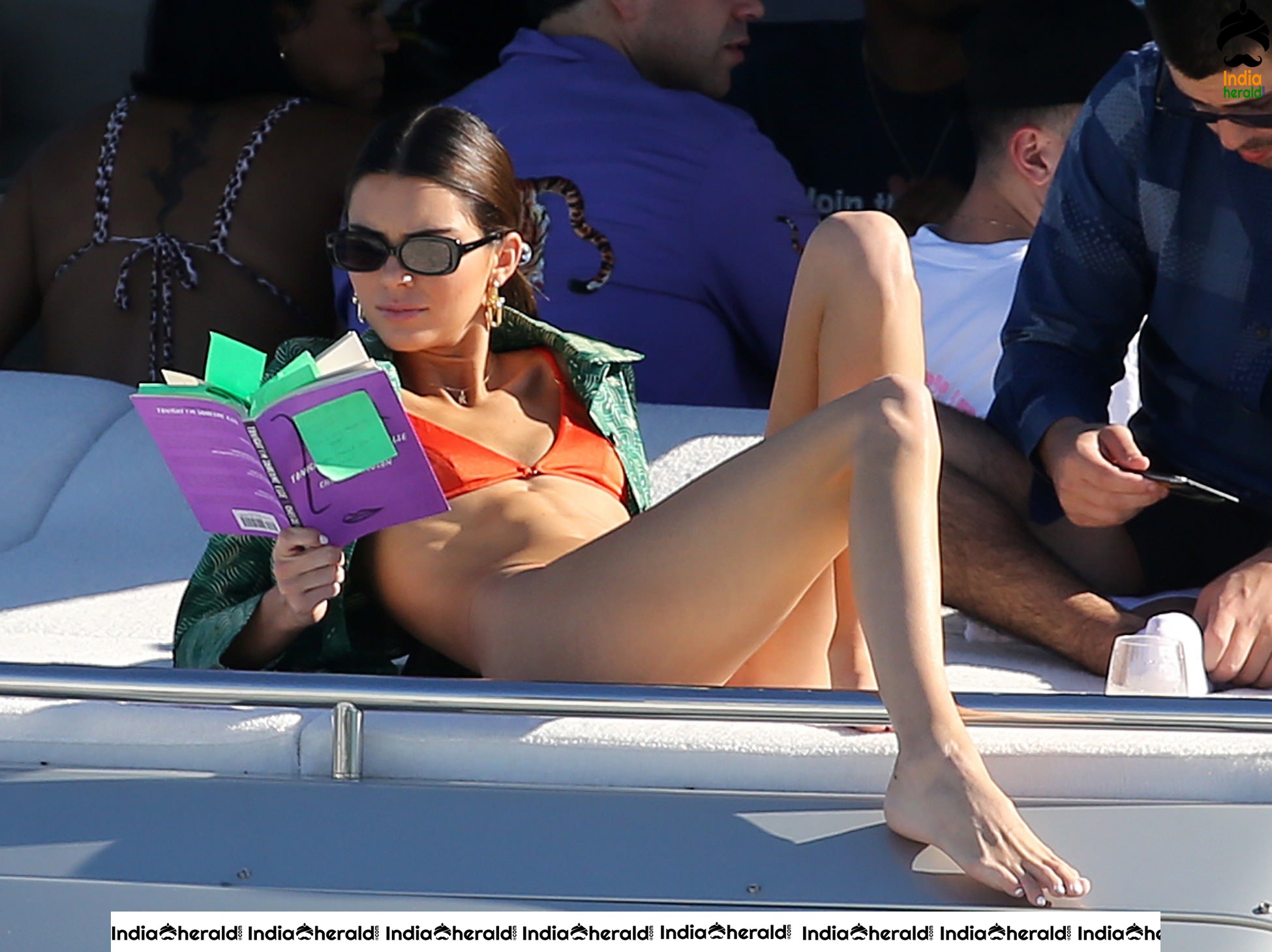 Kendall Jenner in Orange Bikini on a Yacht in Miami Set 1