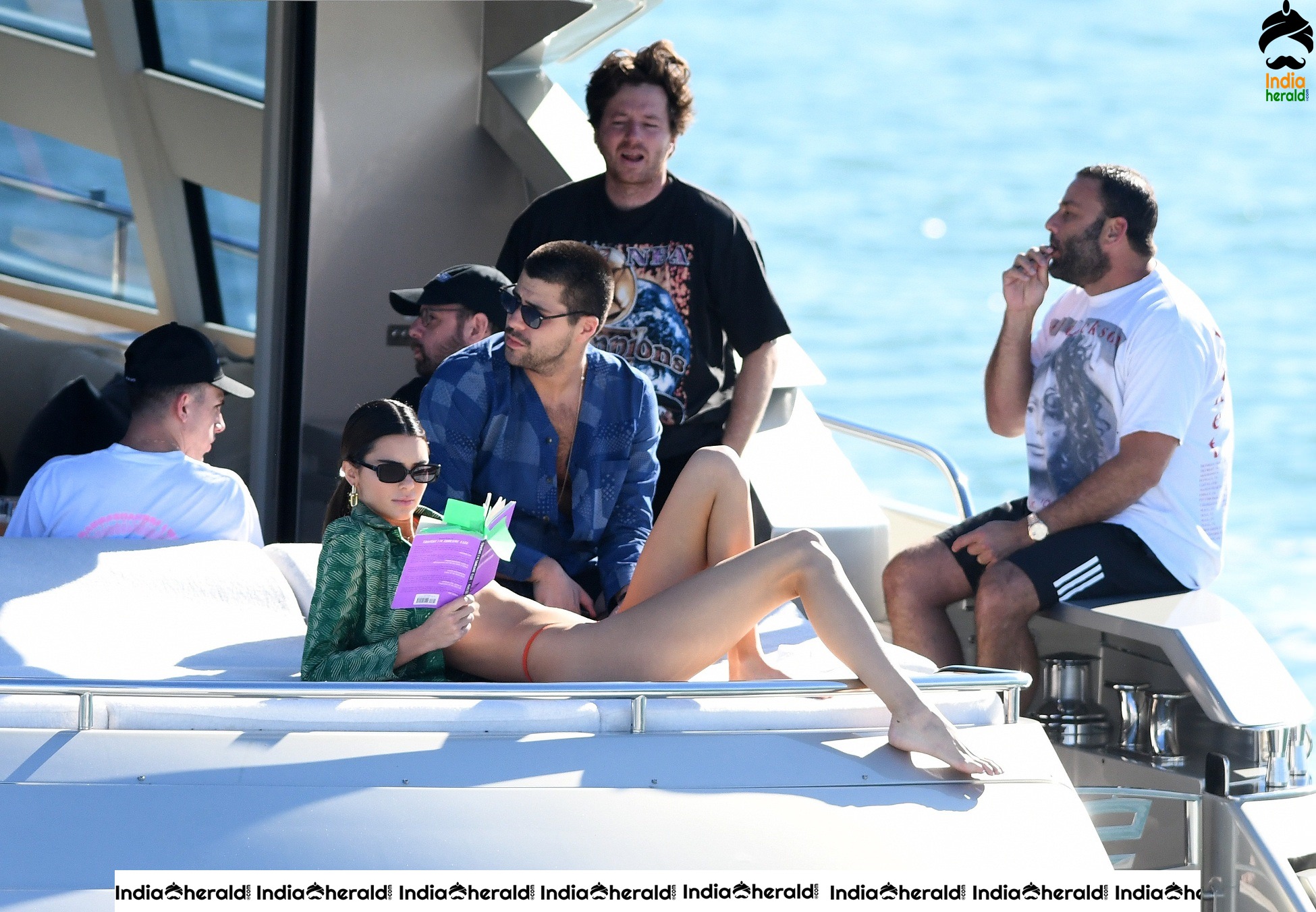 Kendall Jenner in Orange Bikini on a Yacht in Miami Set 2