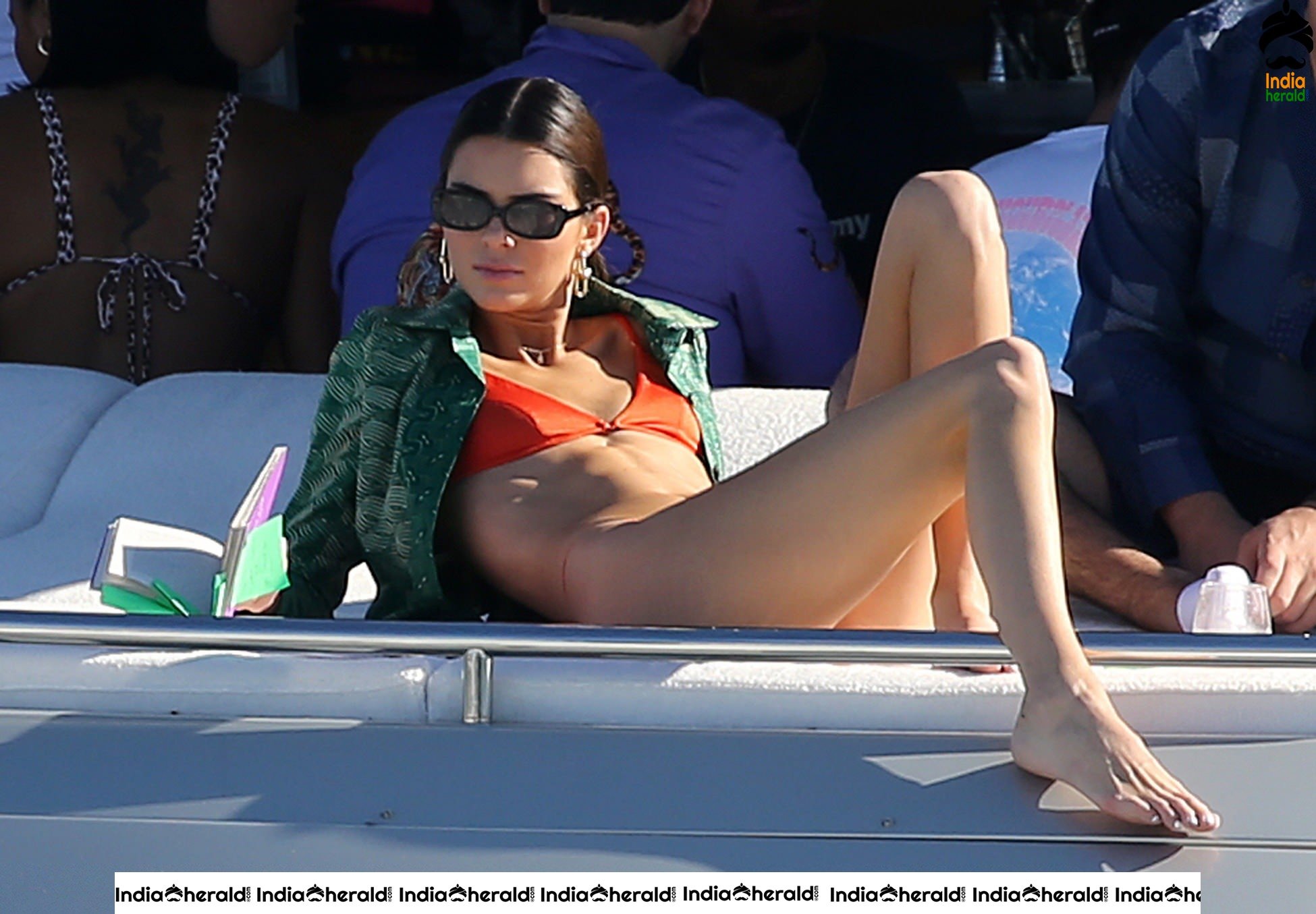 Kendall Jenner in Orange Bikini on a Yacht in Miami Set 2