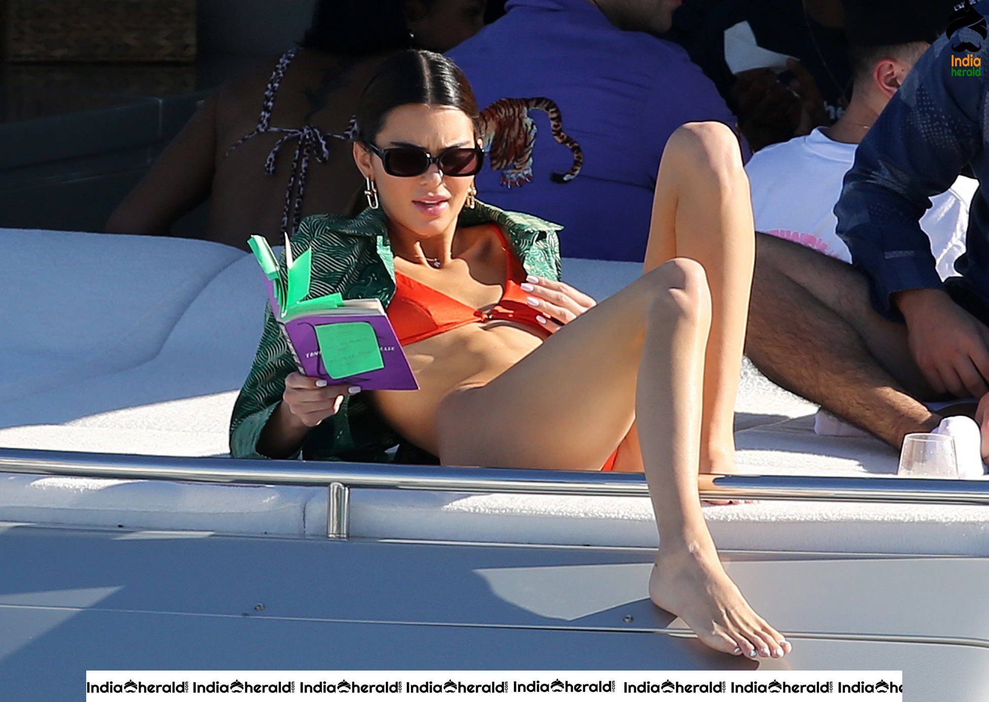 Kendall Jenner in Orange Bikini on a Yacht in Miami Set 2