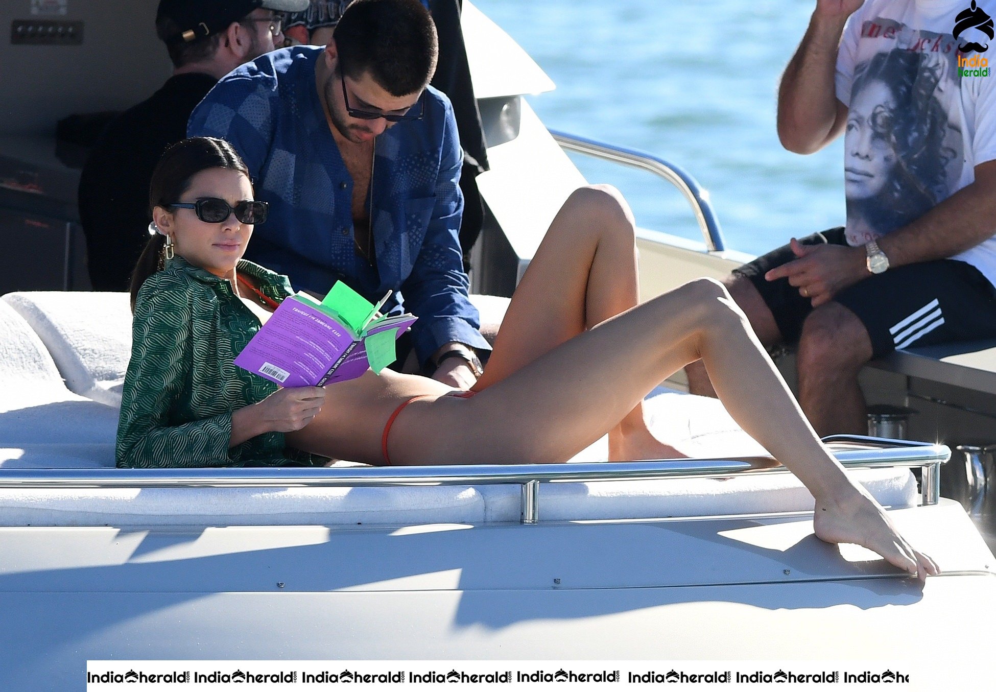 Kendall Jenner in Orange Bikini on a Yacht in Miami Set 2