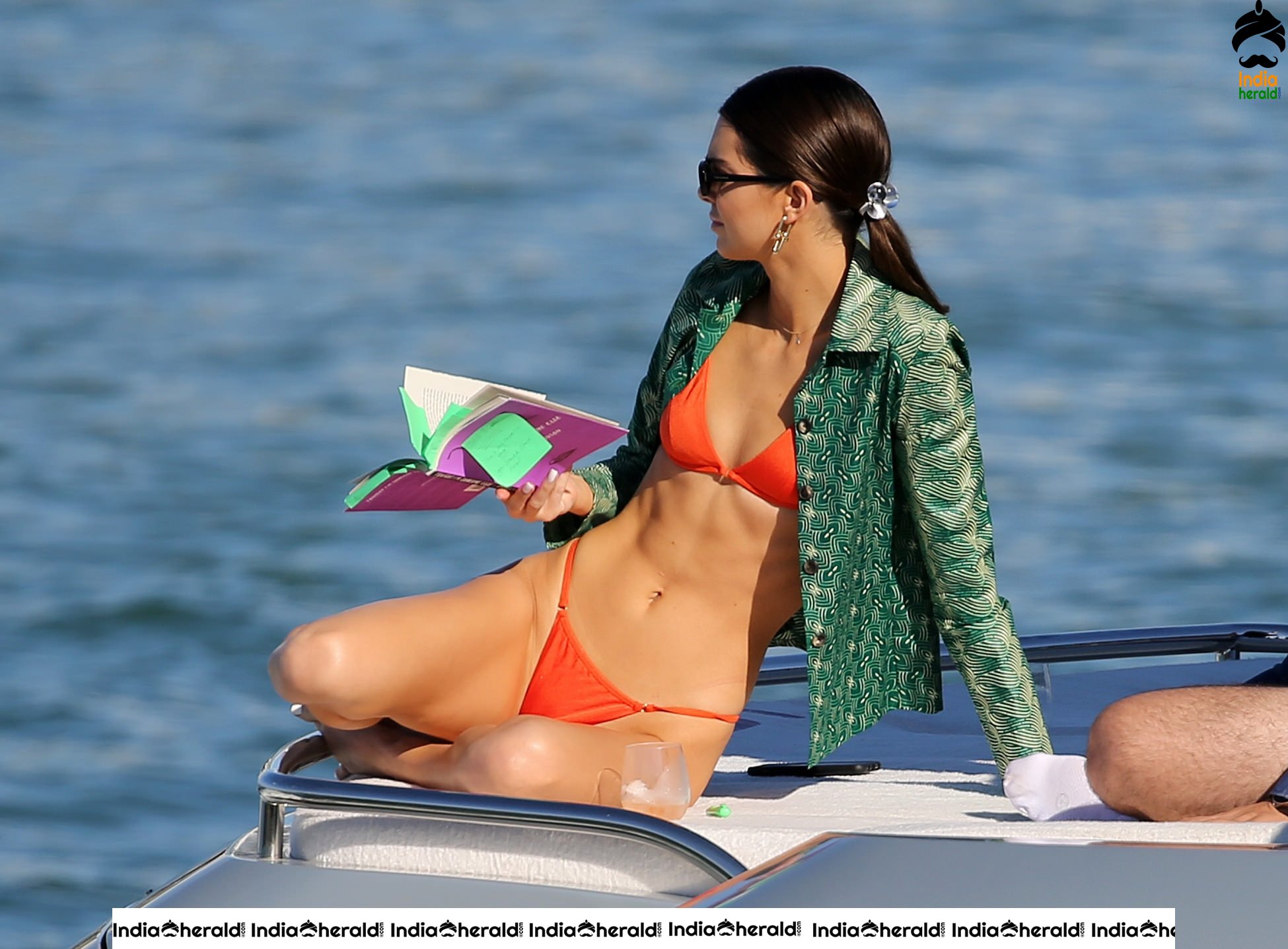 Kendall Jenner in Orange Bikini on a Yacht in Miami Set 2