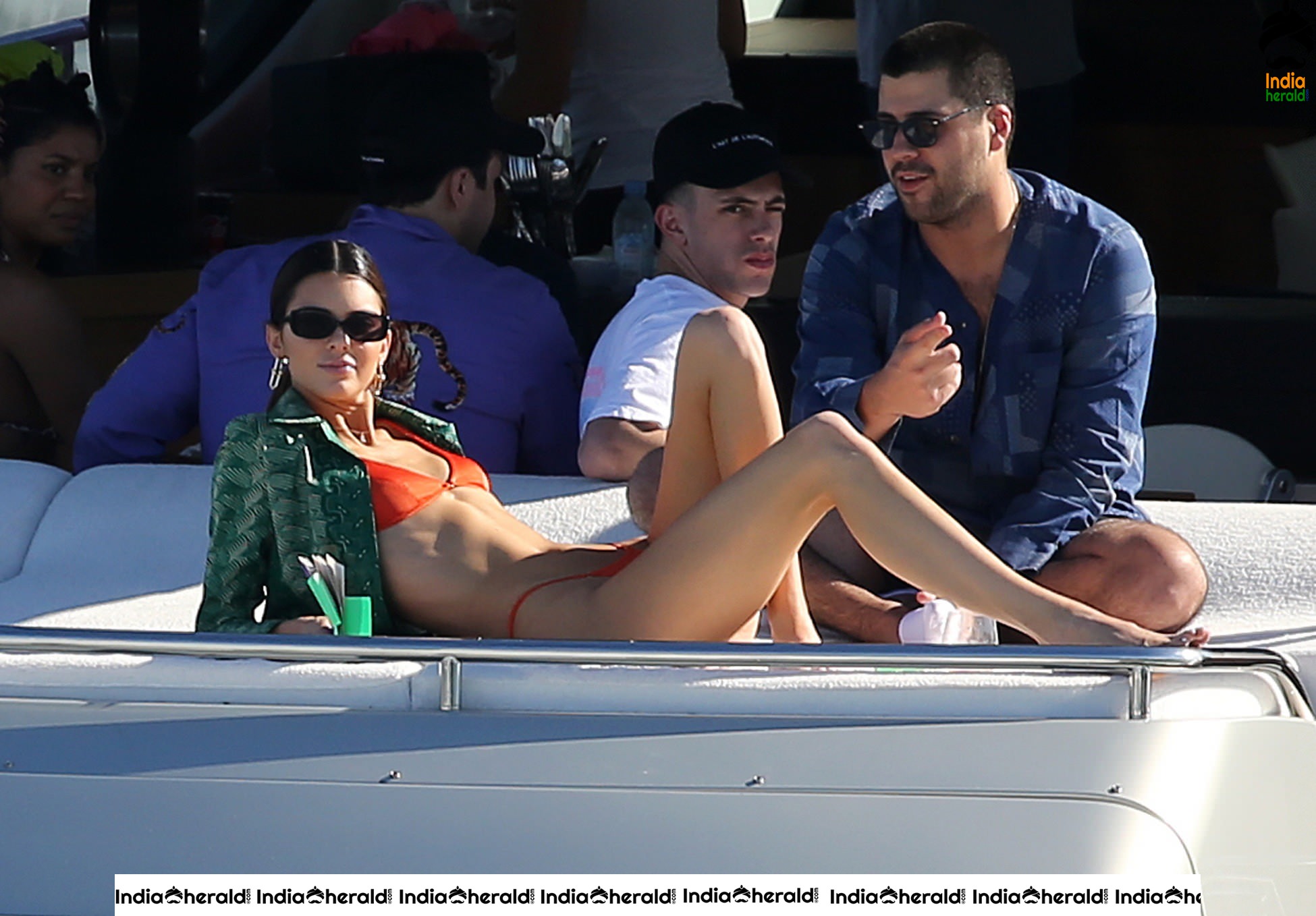 Kendall Jenner in Orange Bikini on a Yacht in Miami Set 2