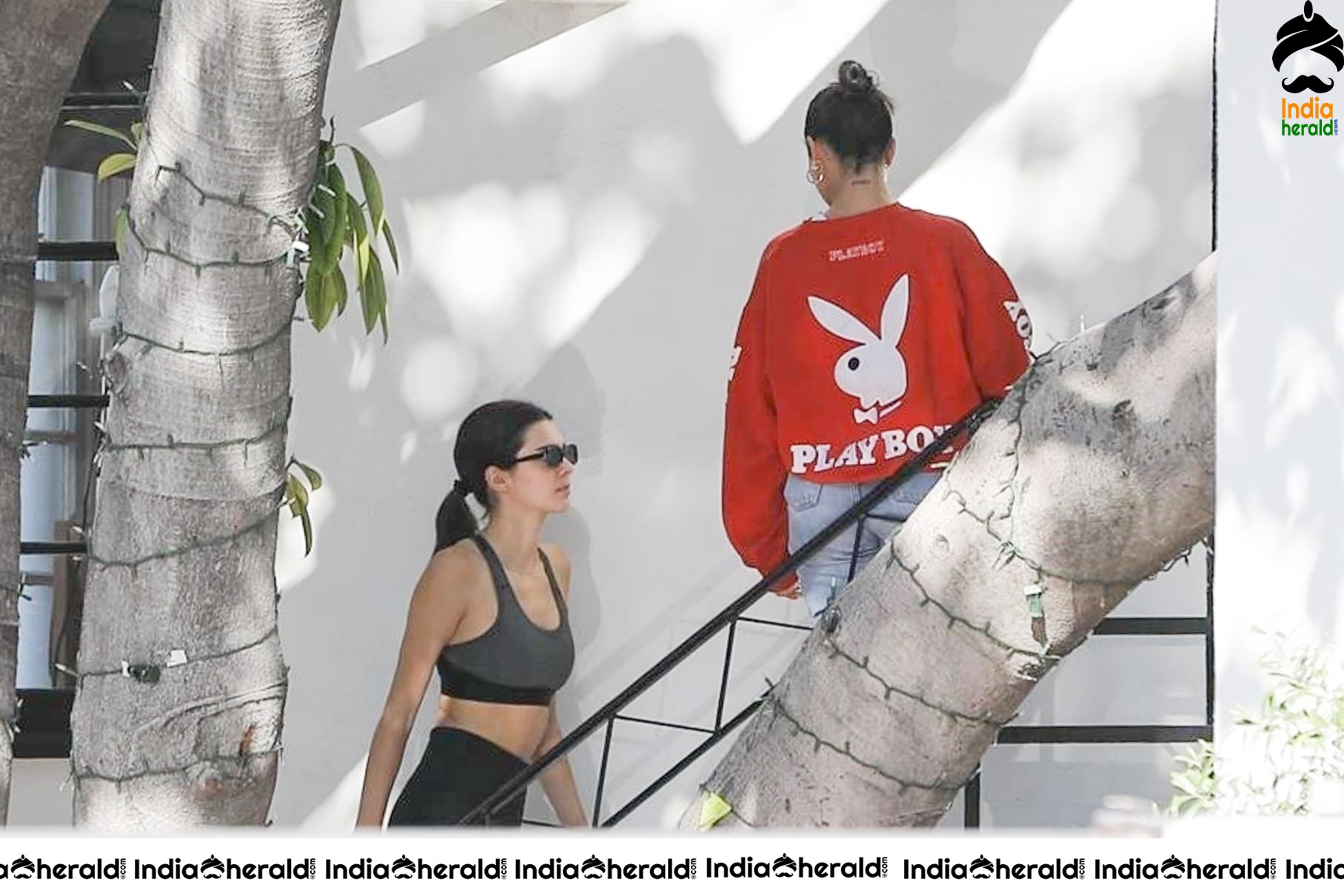 Kendall Jenner in Sports Bra while caught by Paparazzi outside her hair colorist office in LA