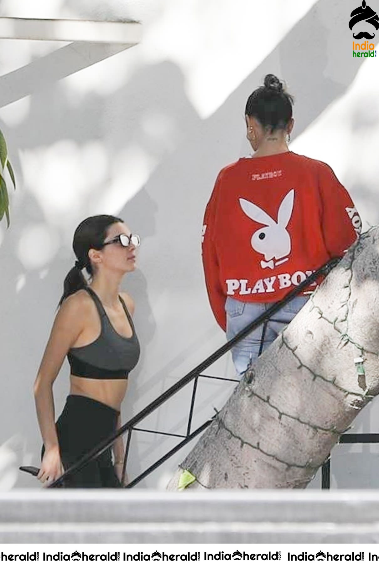 Kendall Jenner in Sports Bra while caught by Paparazzi outside her hair colorist office in LA