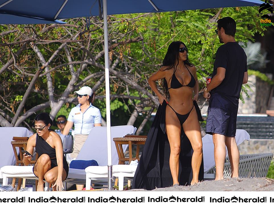 Kim Kardashian in Black Bikini Exposing on the beach in Costa Rica