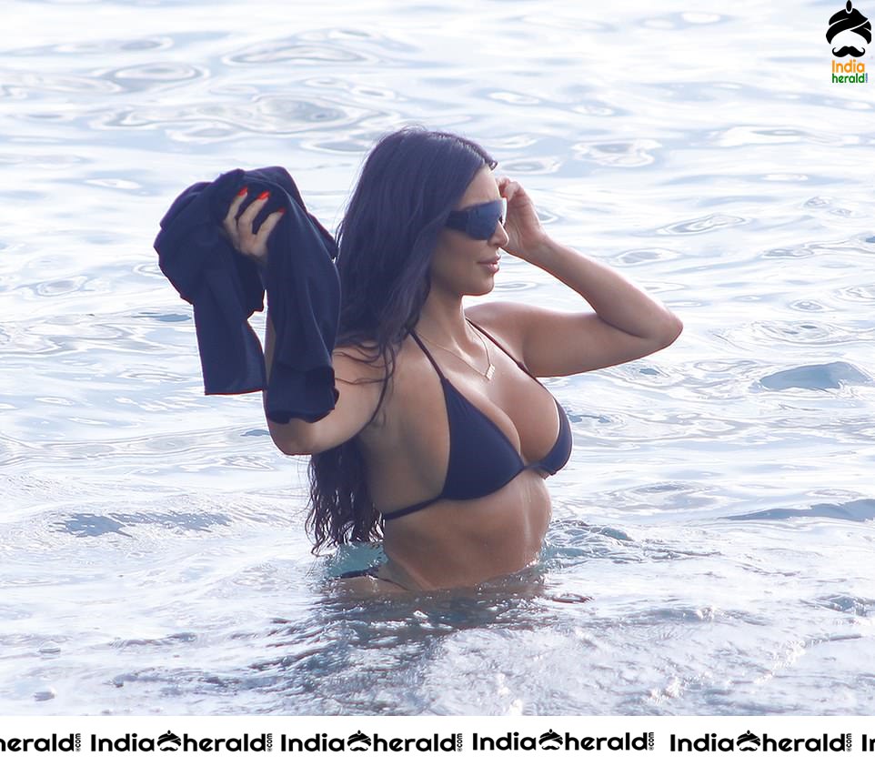 Kim Kardashian in Black Bikini Exposing on the beach in Costa Rica