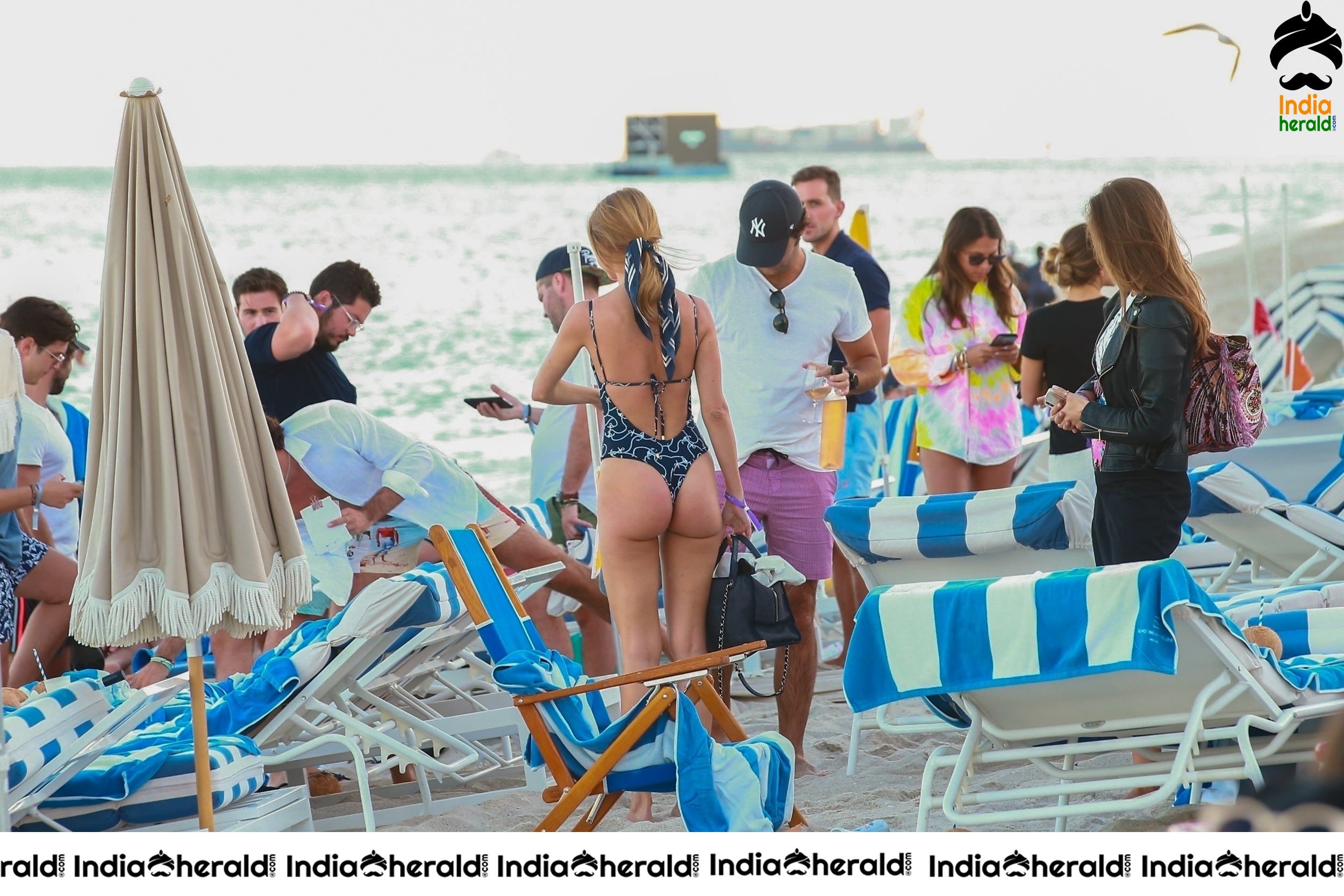 Kimberley Garner shows off her fit figure in a blue bikini on the beach in Miami Set 2