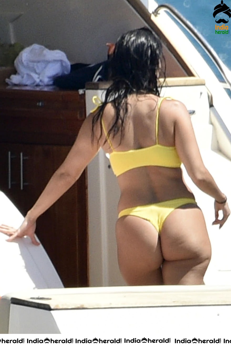 Kourtney Kardashian exposing her hot body in Bikini on a yacht in Corsica