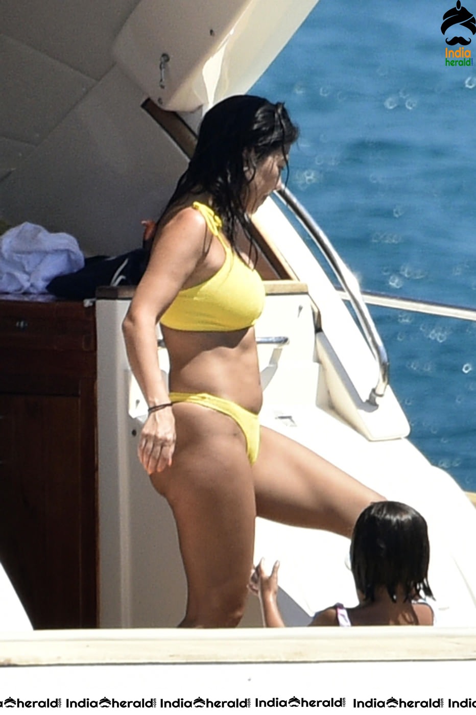 Kourtney Kardashian exposing her hot body in Bikini on a yacht in Corsica