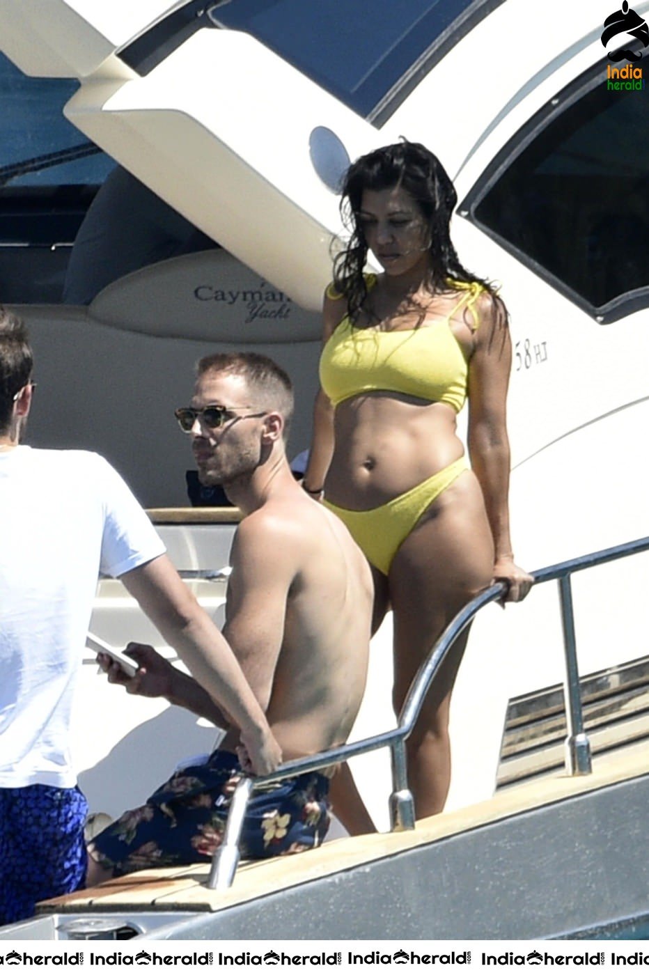 Kourtney Kardashian exposing her hot body in Bikini on a yacht in Corsica