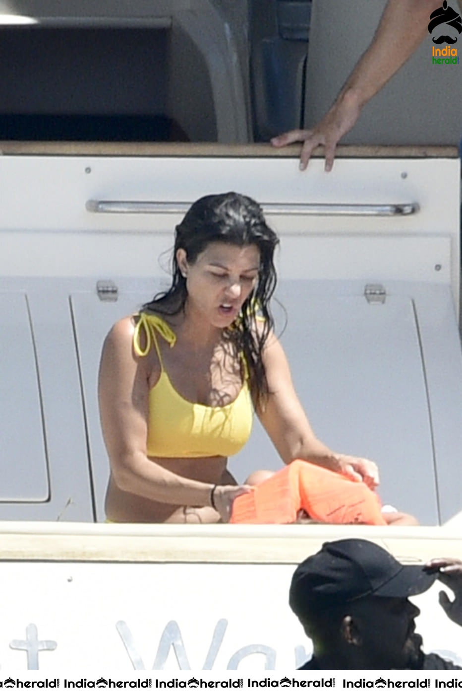 Kourtney Kardashian exposing her hot body in Bikini on a yacht in Corsica