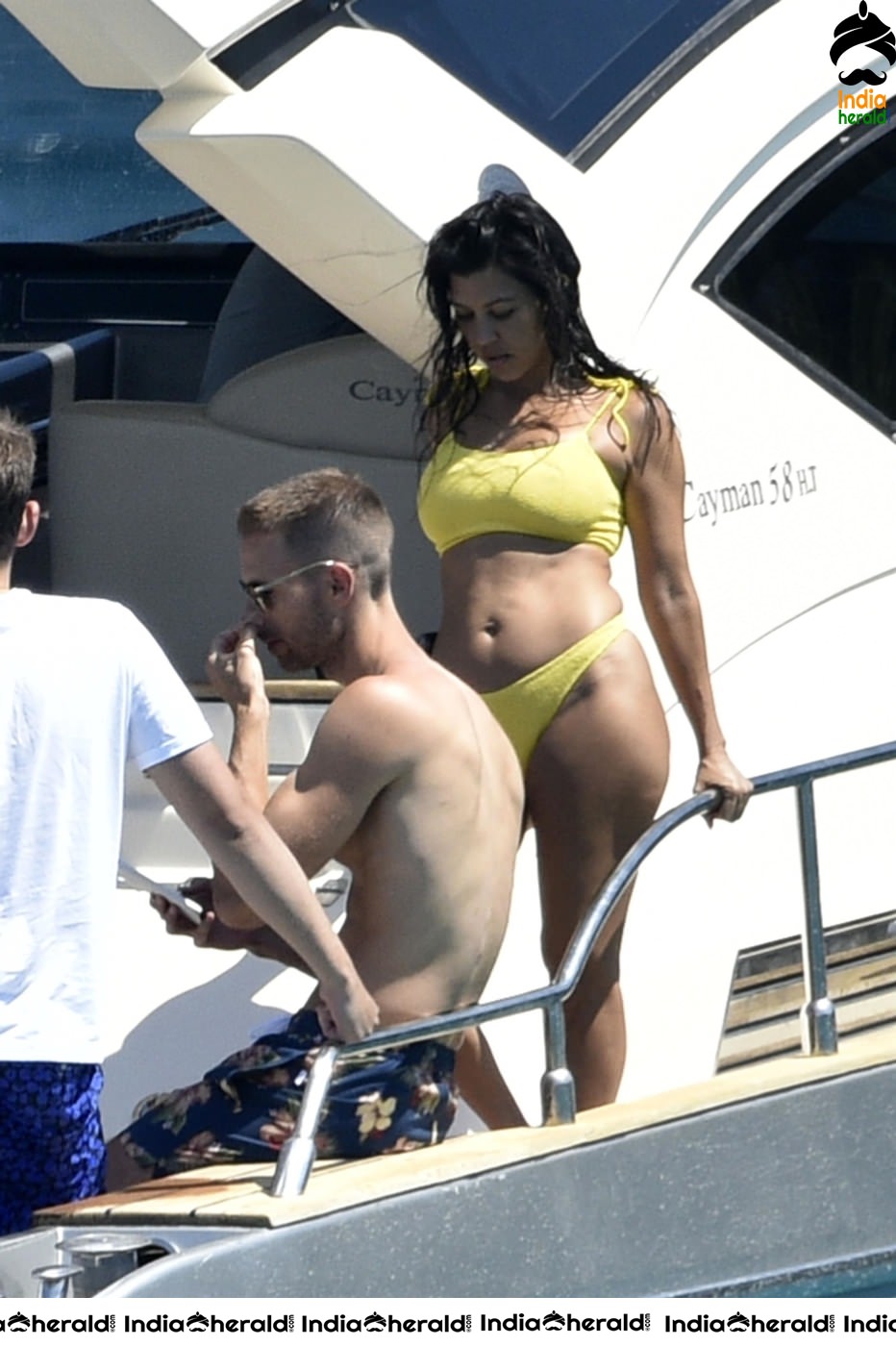 Kourtney Kardashian exposing her hot body in Bikini on a yacht in Corsica