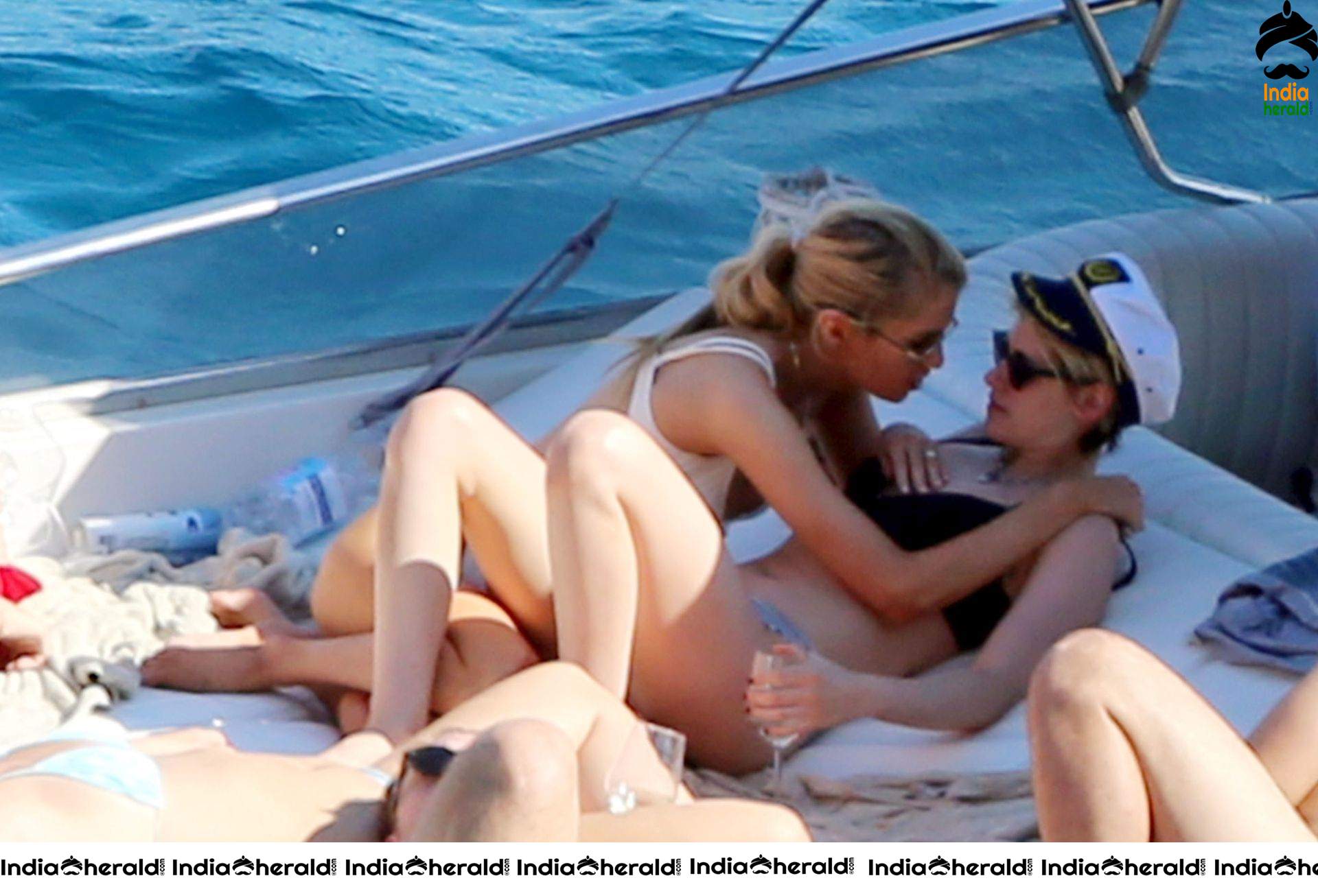 Kristen Stewart and Stella Maxwell Kissing and Cuddling each other in Bikinis at a Boat in Italy Set 1