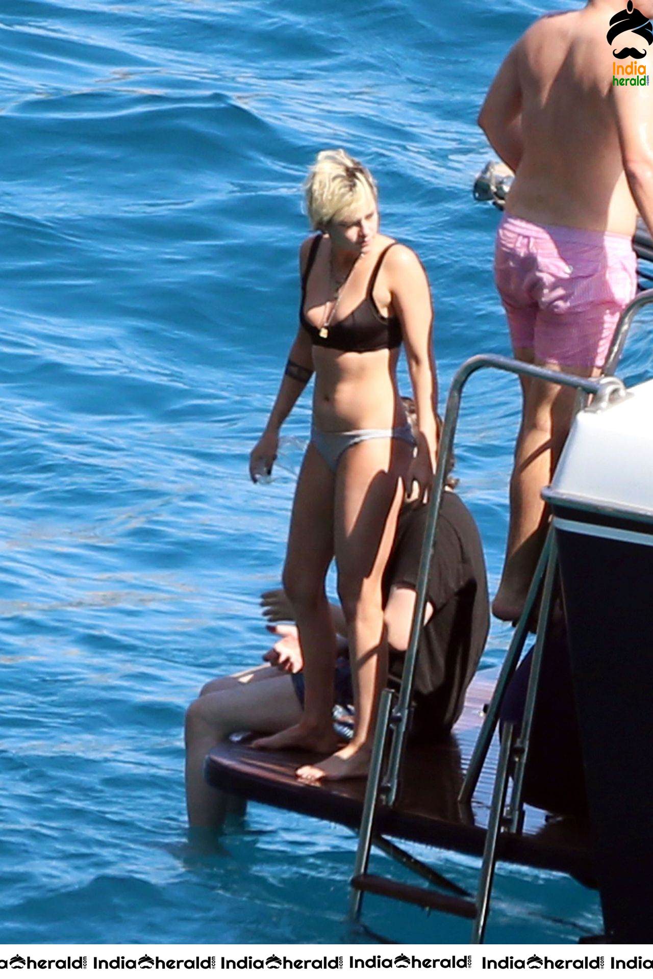 Kristen Stewart and Stella Maxwell Kissing and Cuddling each other in Bikinis at a Boat in Italy Set 2