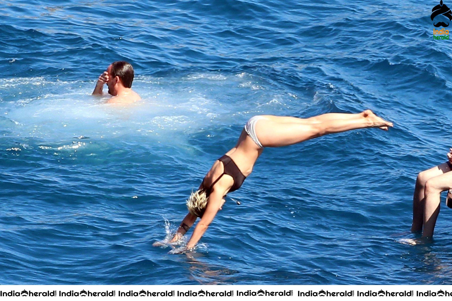 Kristen Stewart and Stella Maxwell Kissing and Cuddling each other in Bikinis at a Boat in Italy Set 2