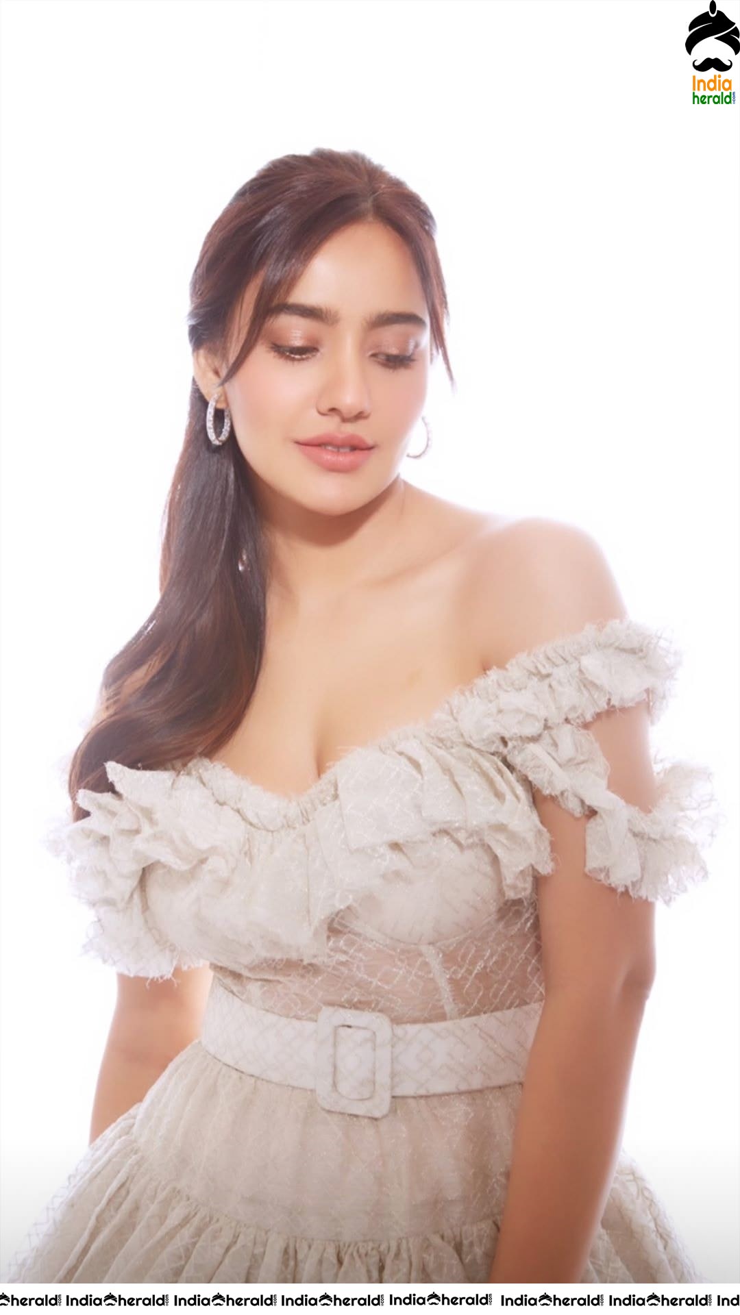 Latest Clicks of Neha Sharma in Short and Sexy Frock