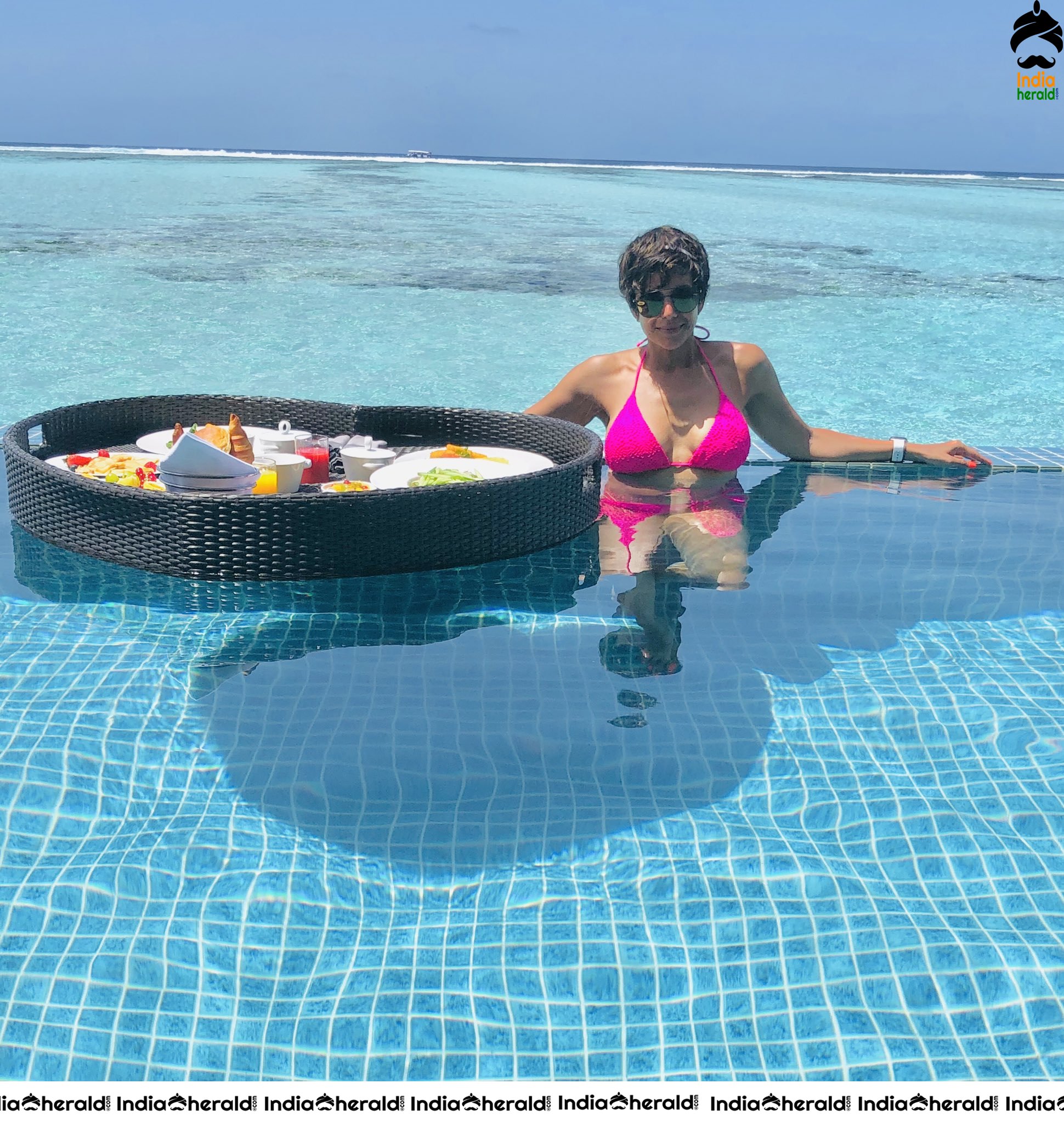 Mandira Bedi Hot Bikini Photos by Poolside Exposing her Assets
