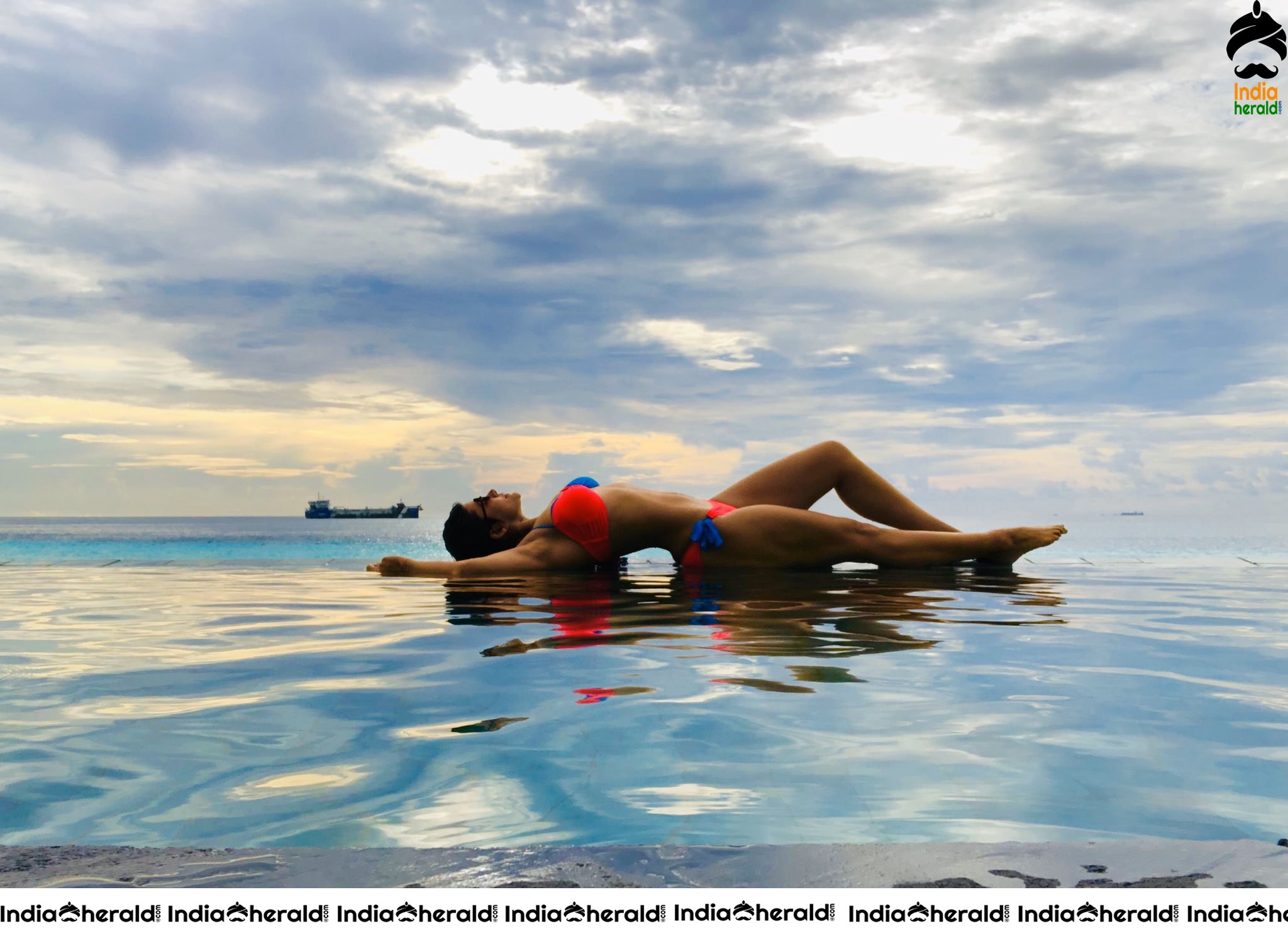 Mandira Bedi Hot Bikini Photos by Poolside Exposing her Assets