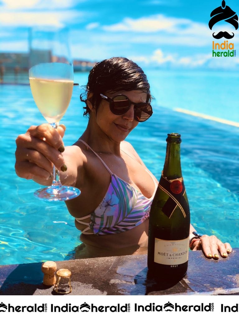 Mandira Bedi Hot Bikini Photos by Poolside Exposing her Assets