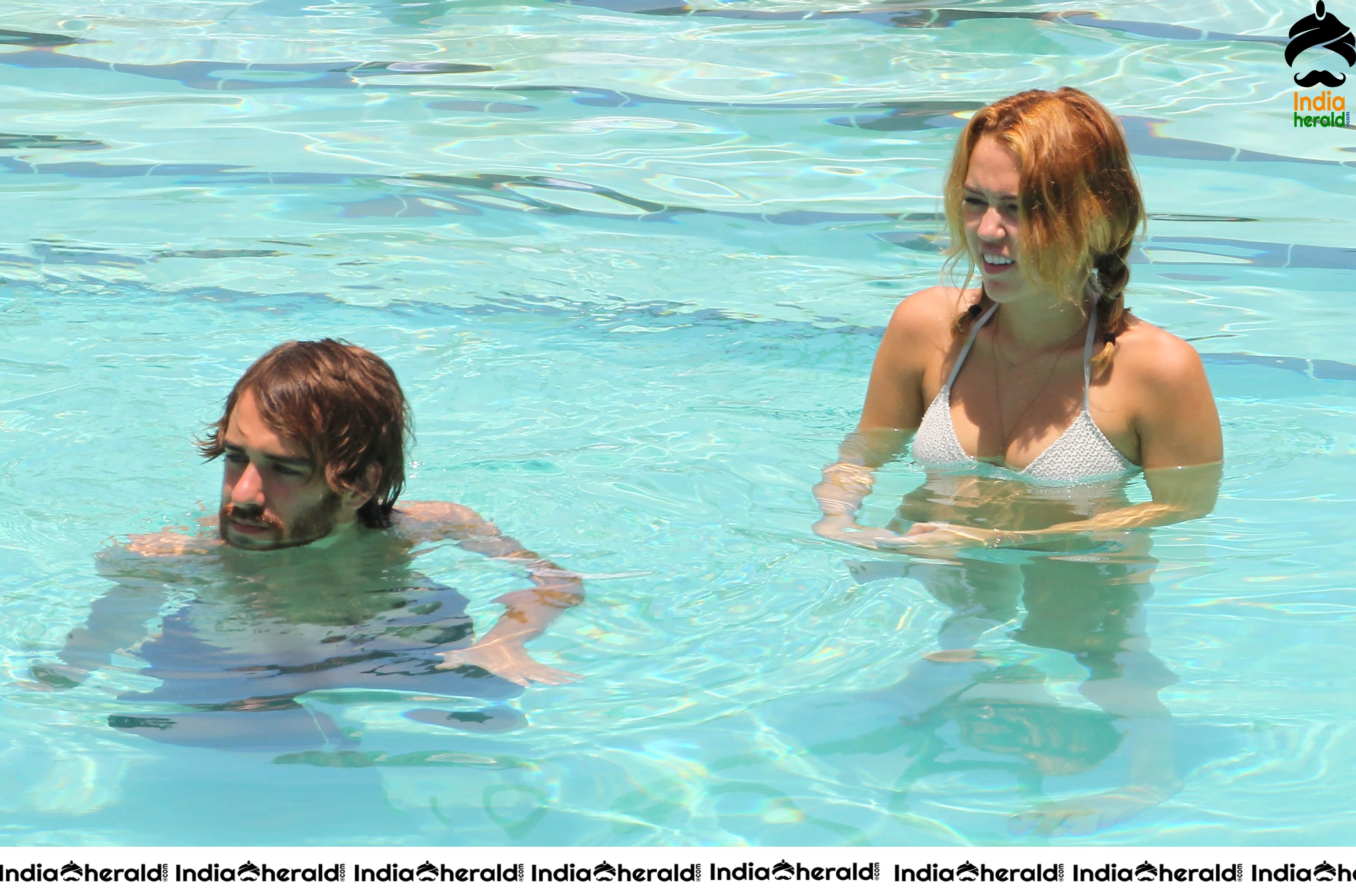 Miley Cyrus caught in Bikini while chilling by Pool Set 1
