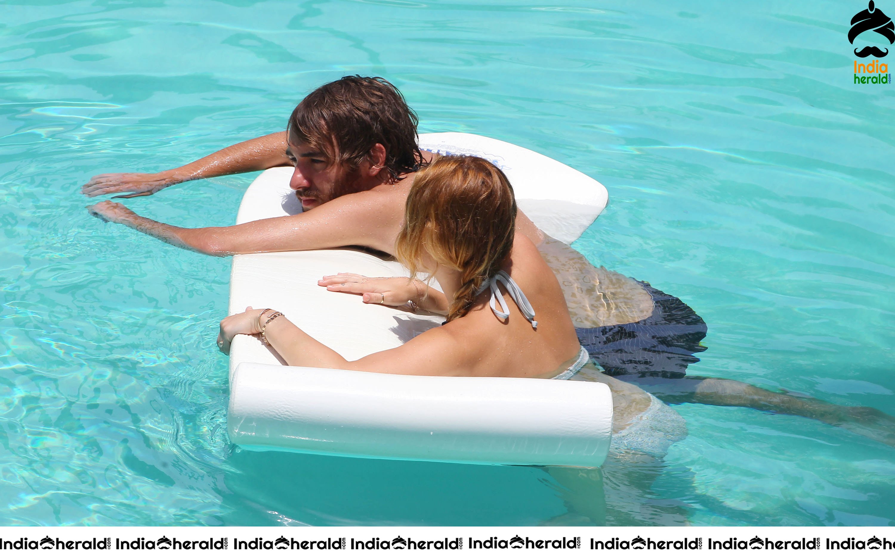 Miley Cyrus caught in Bikini while chilling by Pool Set 1