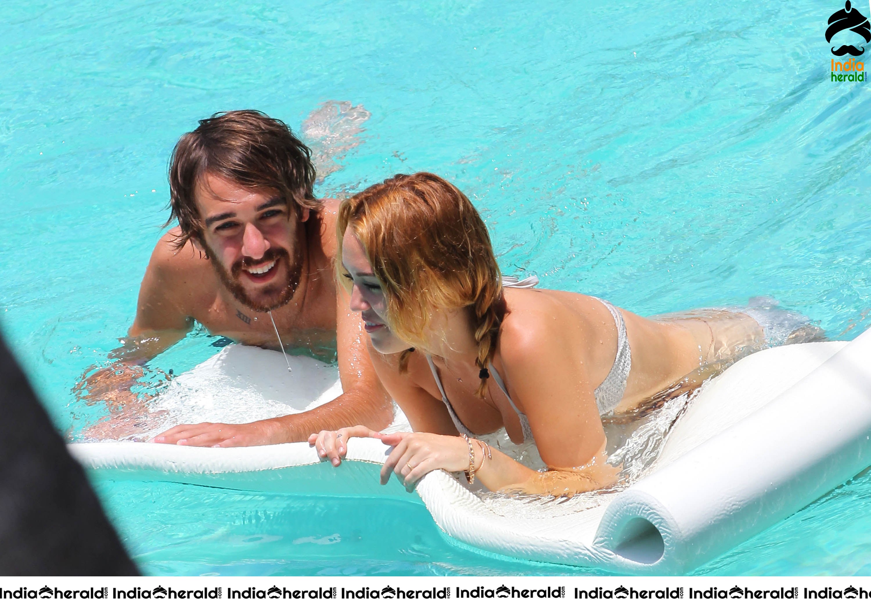 Miley Cyrus caught in Bikini while chilling by Pool Set 1