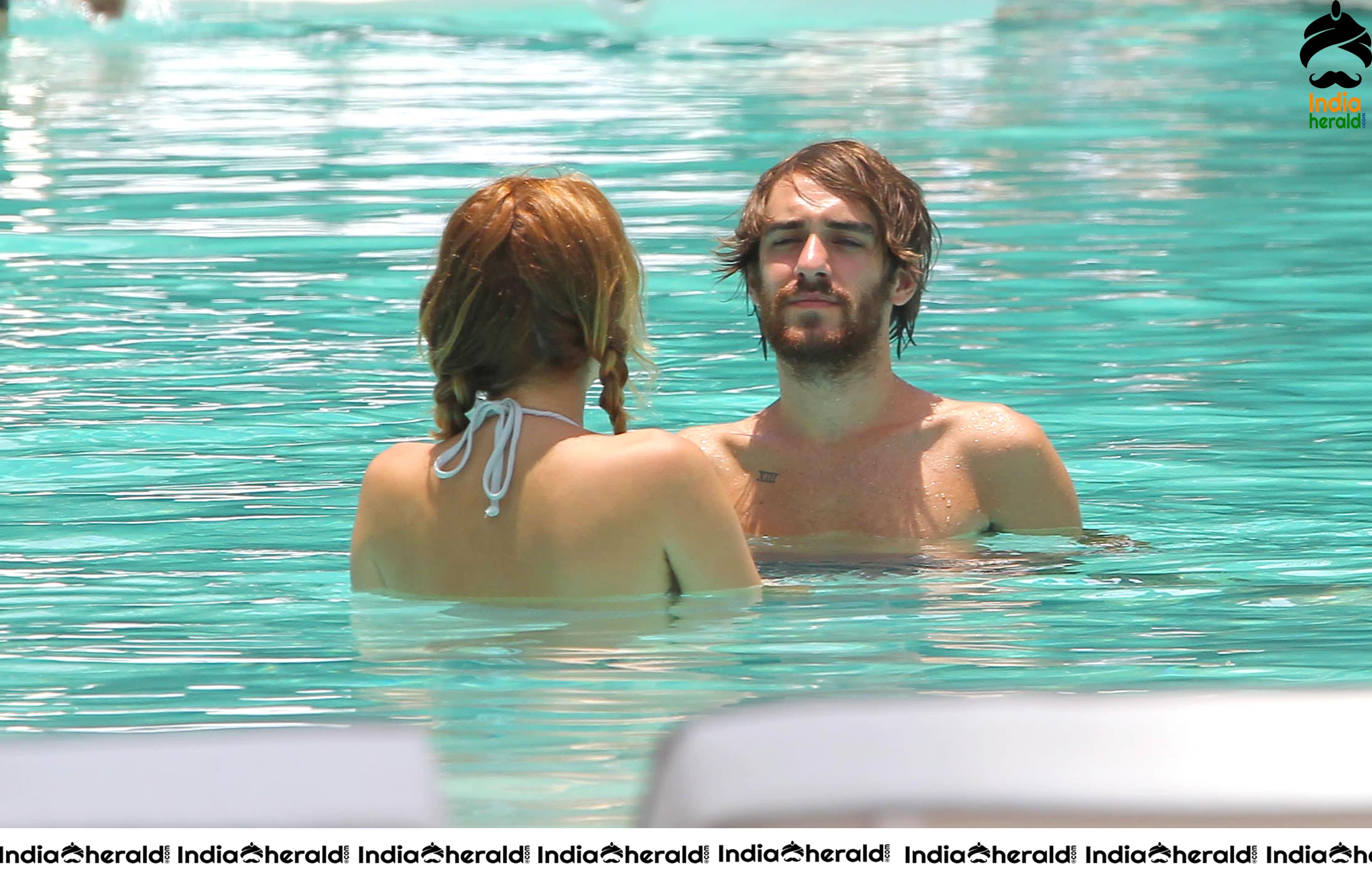 Miley Cyrus caught in Bikini while chilling by Pool Set 1