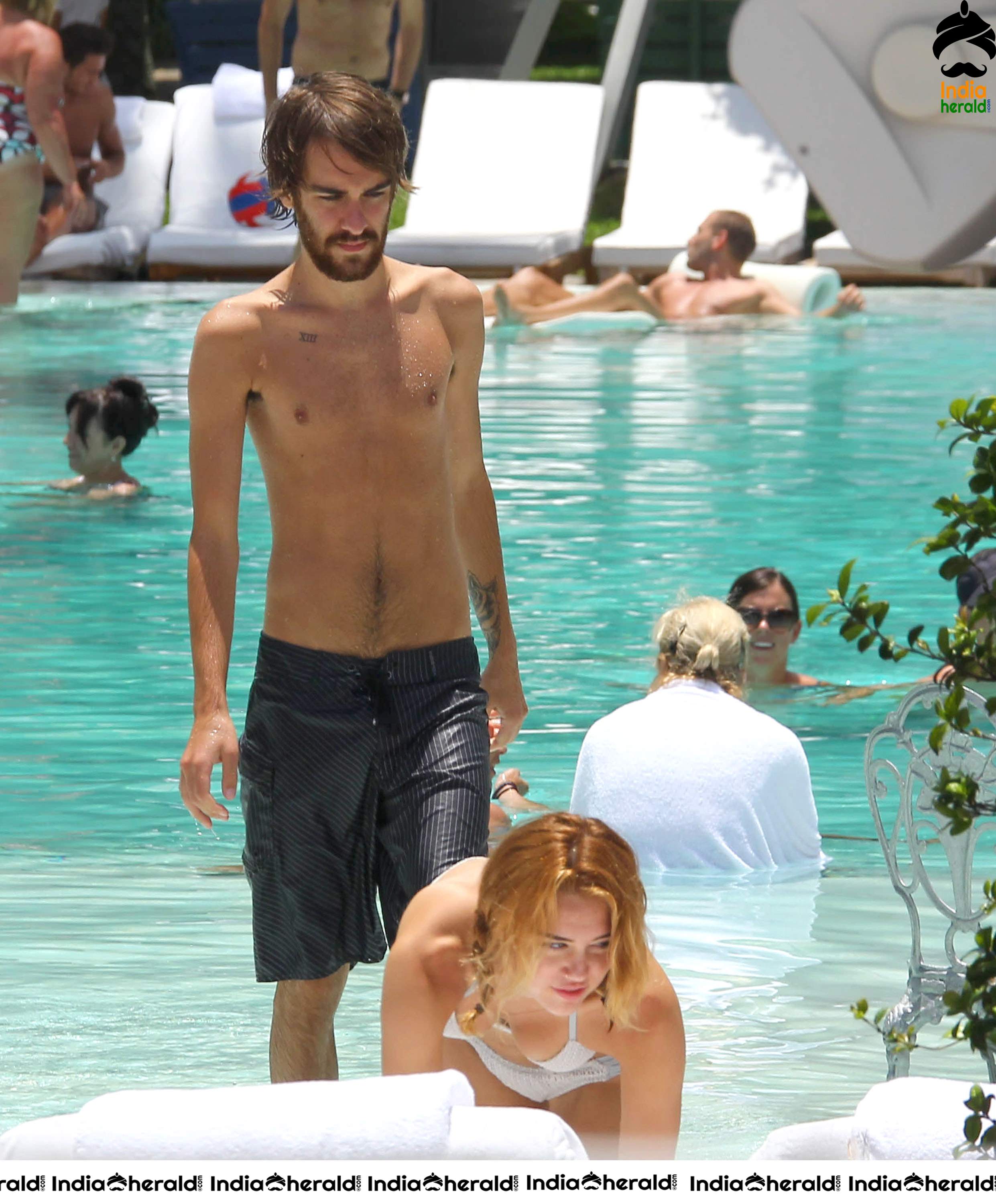 Miley Cyrus caught in Bikini while chilling by Pool Set 2
