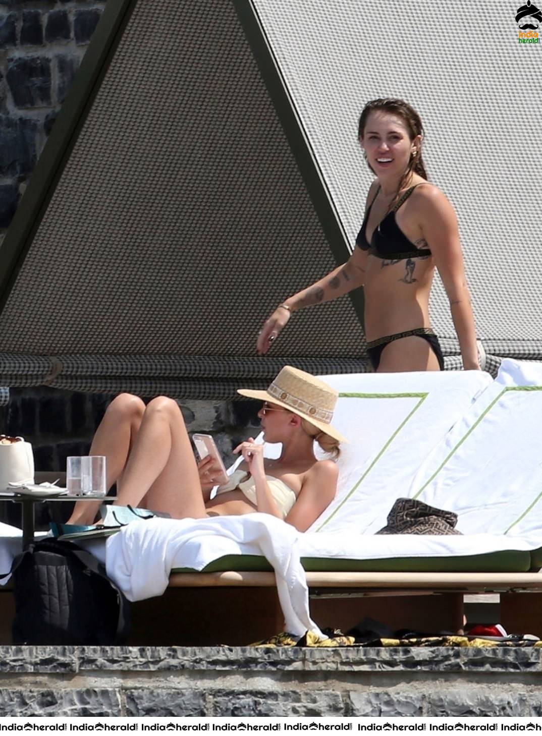 Miley Cyrus in a Bikini and Making Out With Kaitlynn Carter in Lake Como Set 1