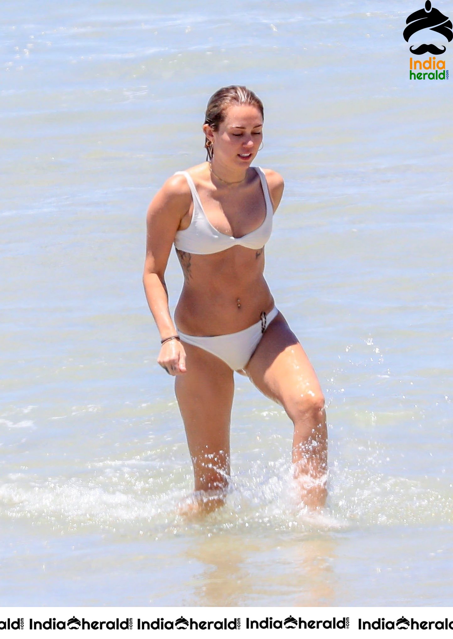 Miley Cyrus Wearing a Bikini at a Beach in Australia Set 1