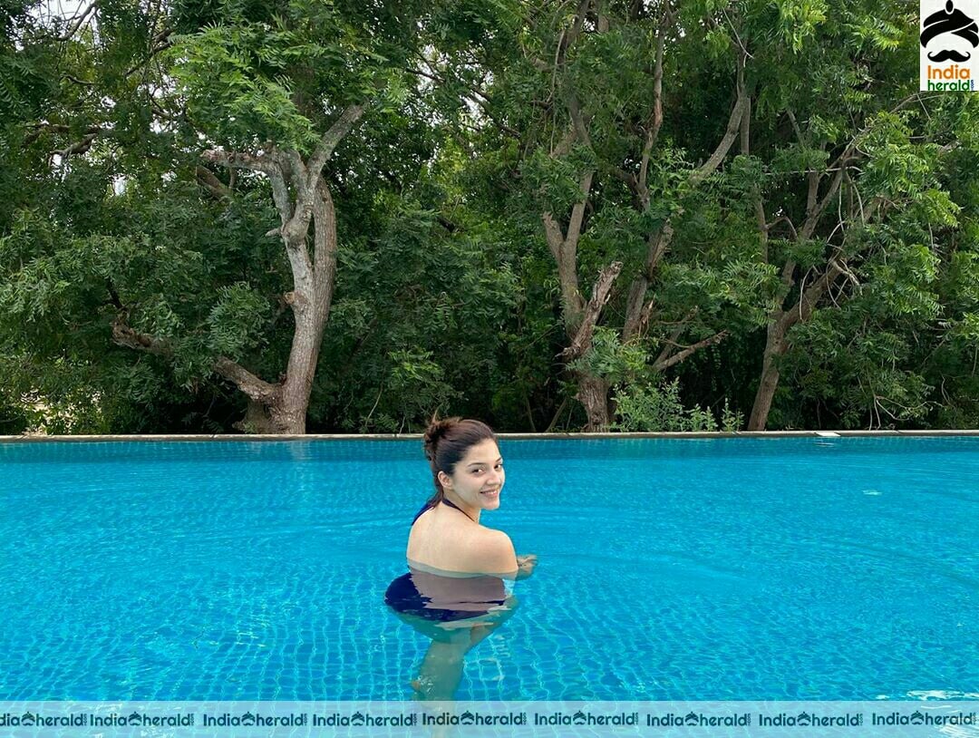 Milky White Babes Mehreen and Tamannaah Exposing Hotness In Bikini