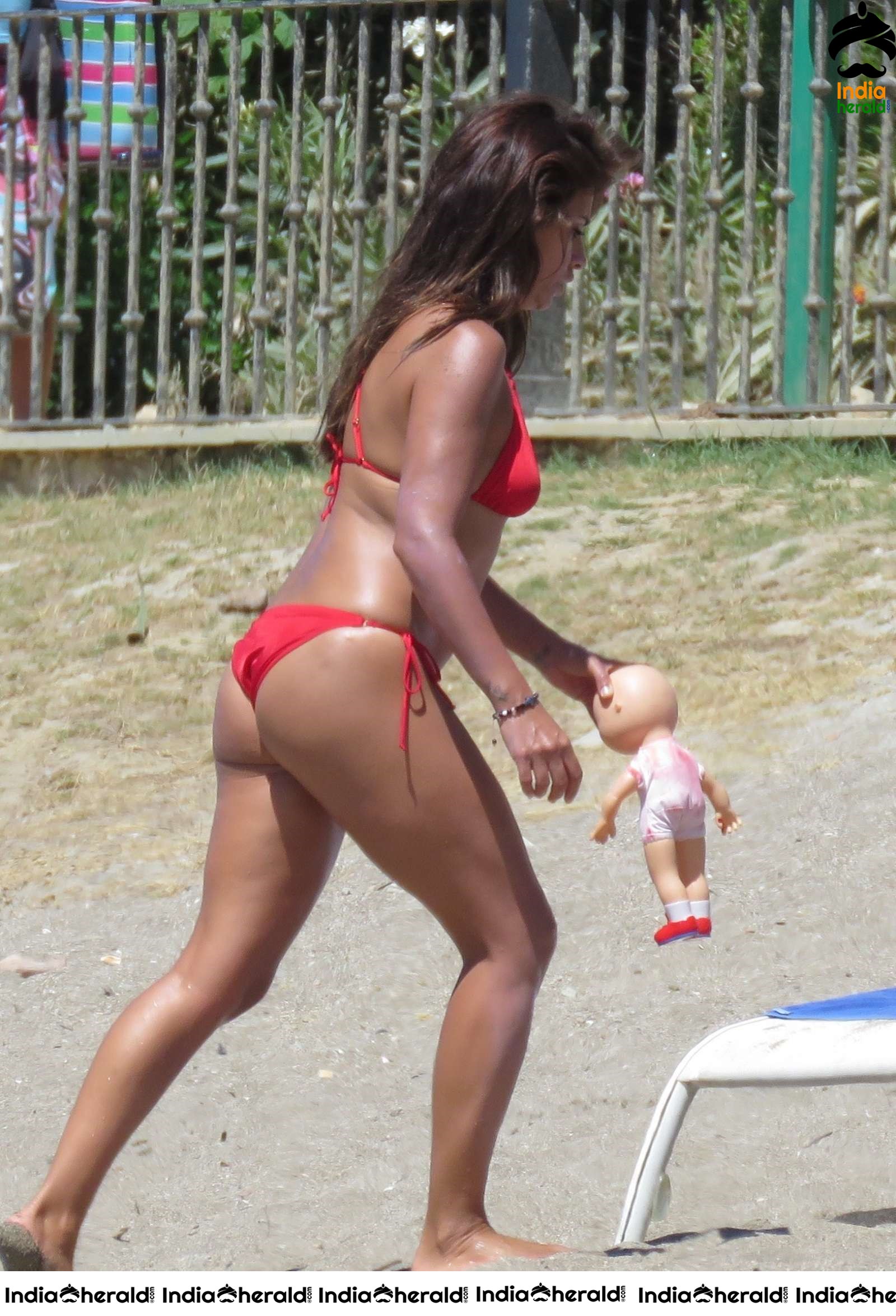 Monica Cruz in Red Bikini on the beach in Marbella Set 2