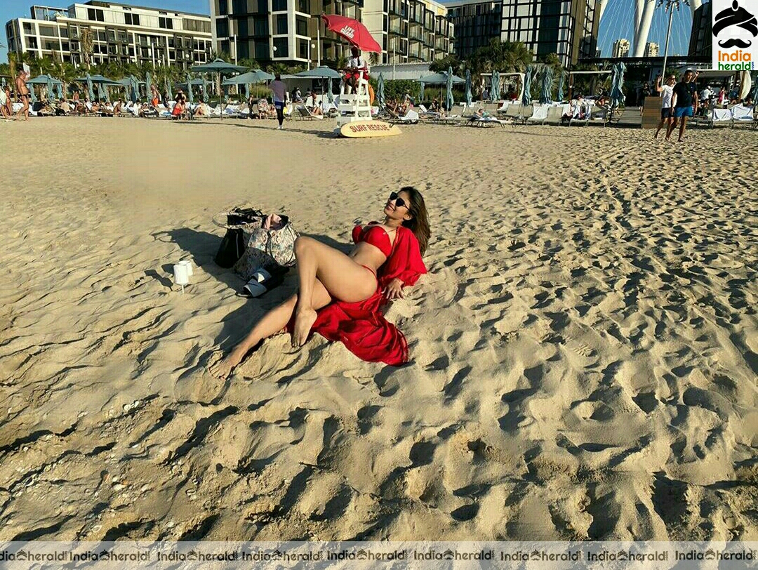 Mouni Roy hot Red Bikini Stills