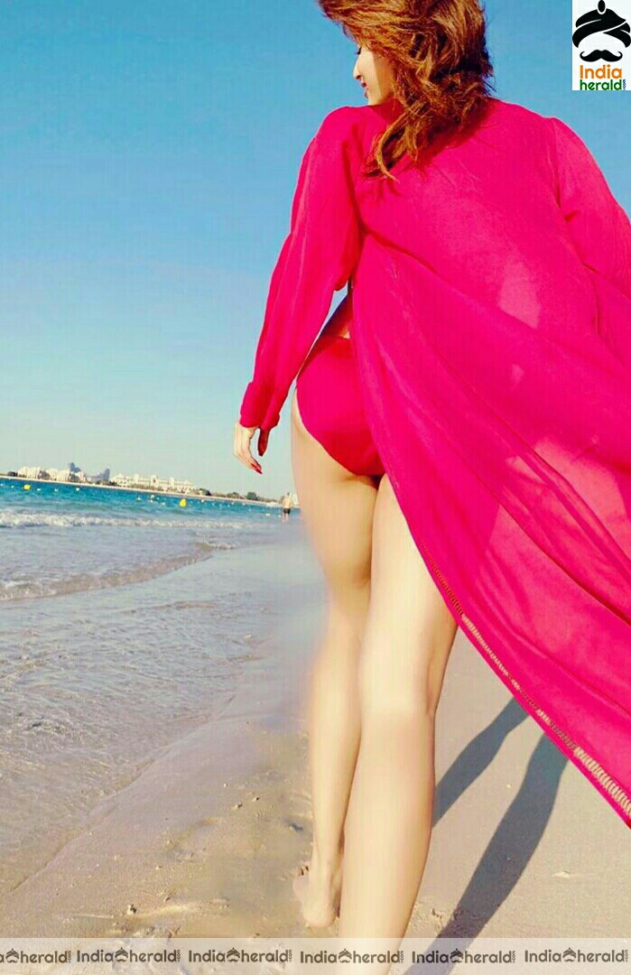Mouni Roy hot Red Bikini Stills