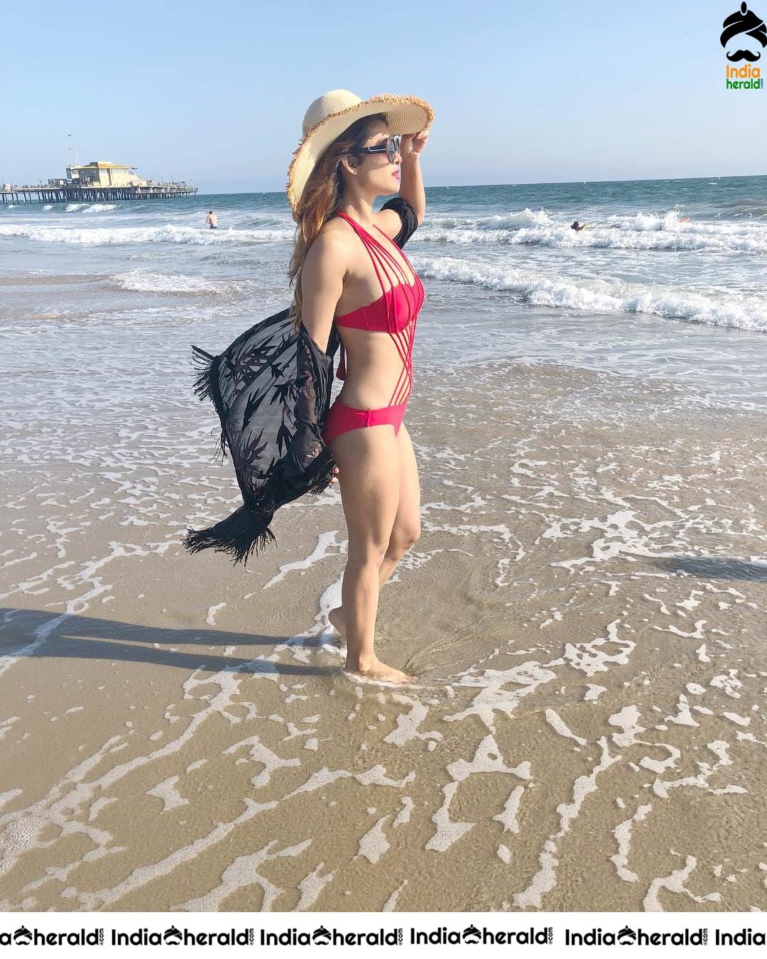 Neha Malik Hot Bikini Clicks on beach sand Set 1