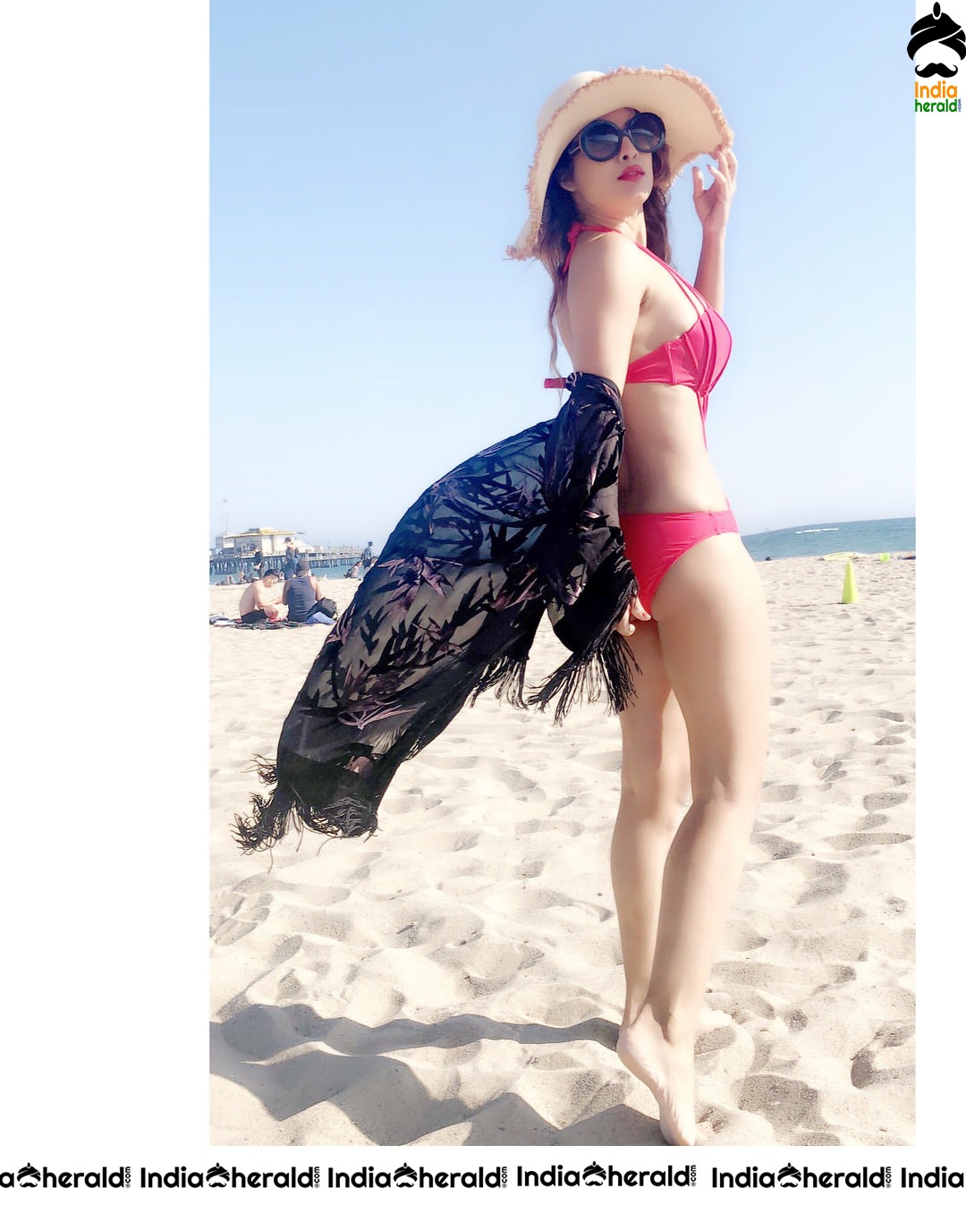 Neha Malik Hot Bikini Clicks on beach sand Set 1