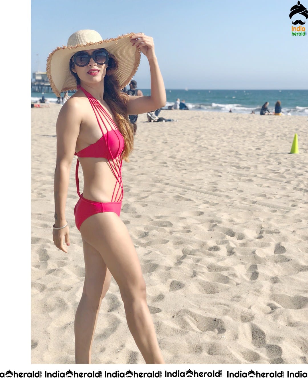 Neha Malik Hot Bikini Clicks on beach sand Set 1