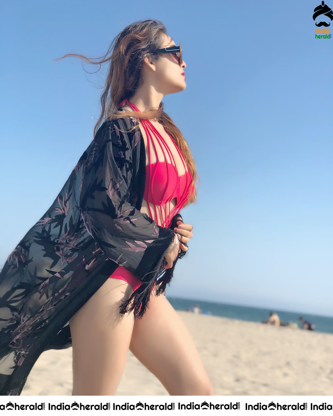 Neha Malik Hot Bikini Clicks on beach sand Set 1