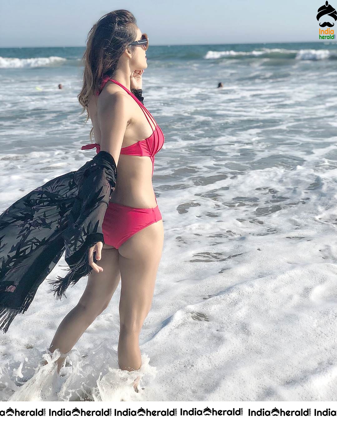 Neha Malik Hot Bikini Clicks on beach sand Set 1