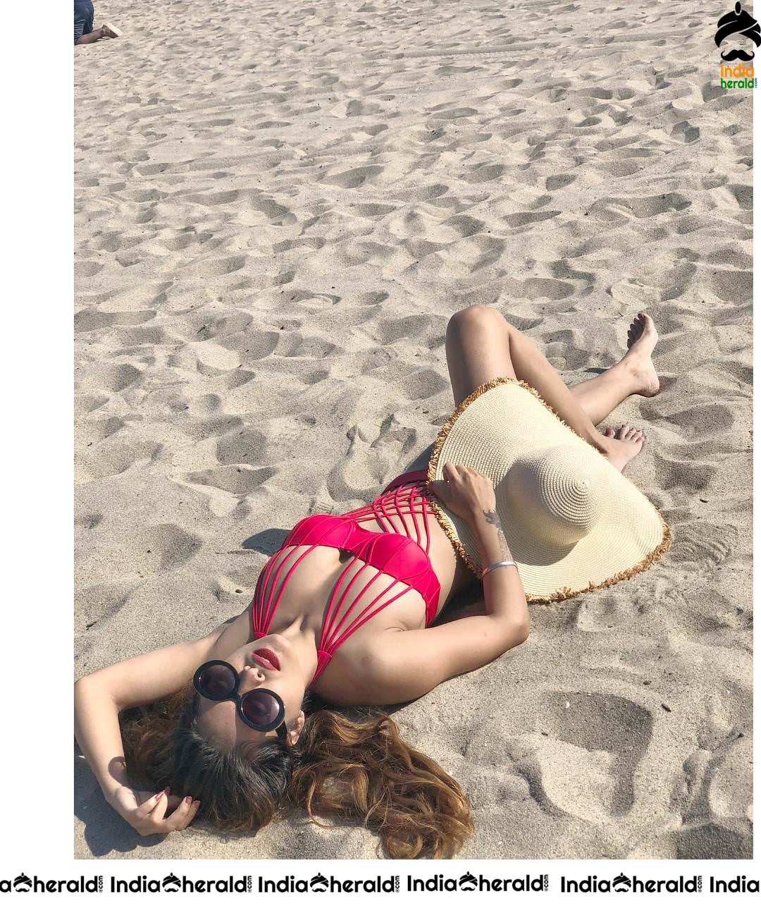 Neha Malik Hot Bikini Clicks on beach sand Set 1