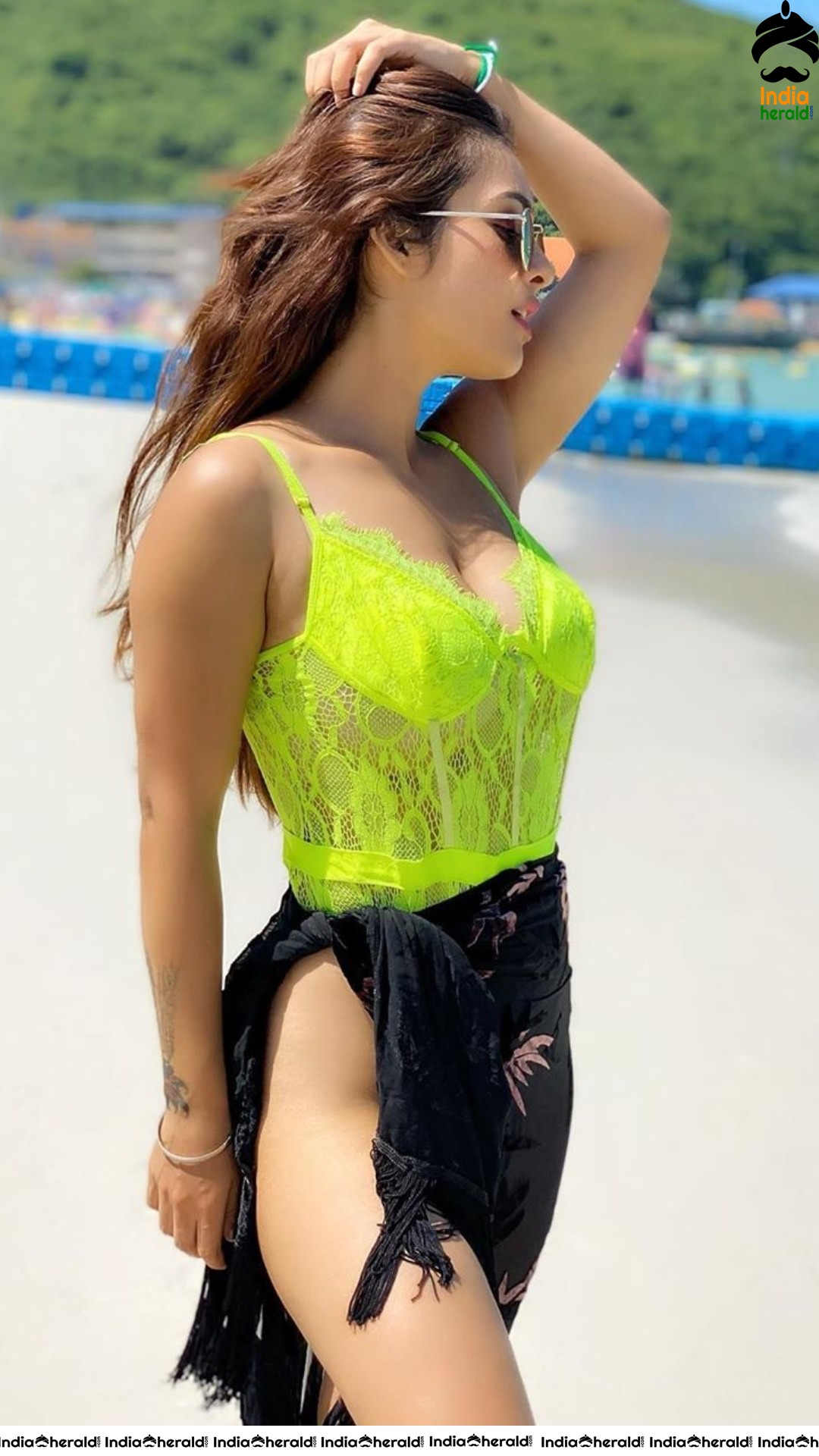 Neha Malik Hot Tempting Photos in Fluorescent Bikini by Beach Side Set 1