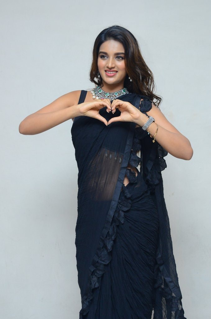 Nidhhi Agerwal Hot Cleavage and Hip Show Photos Collection Set 2