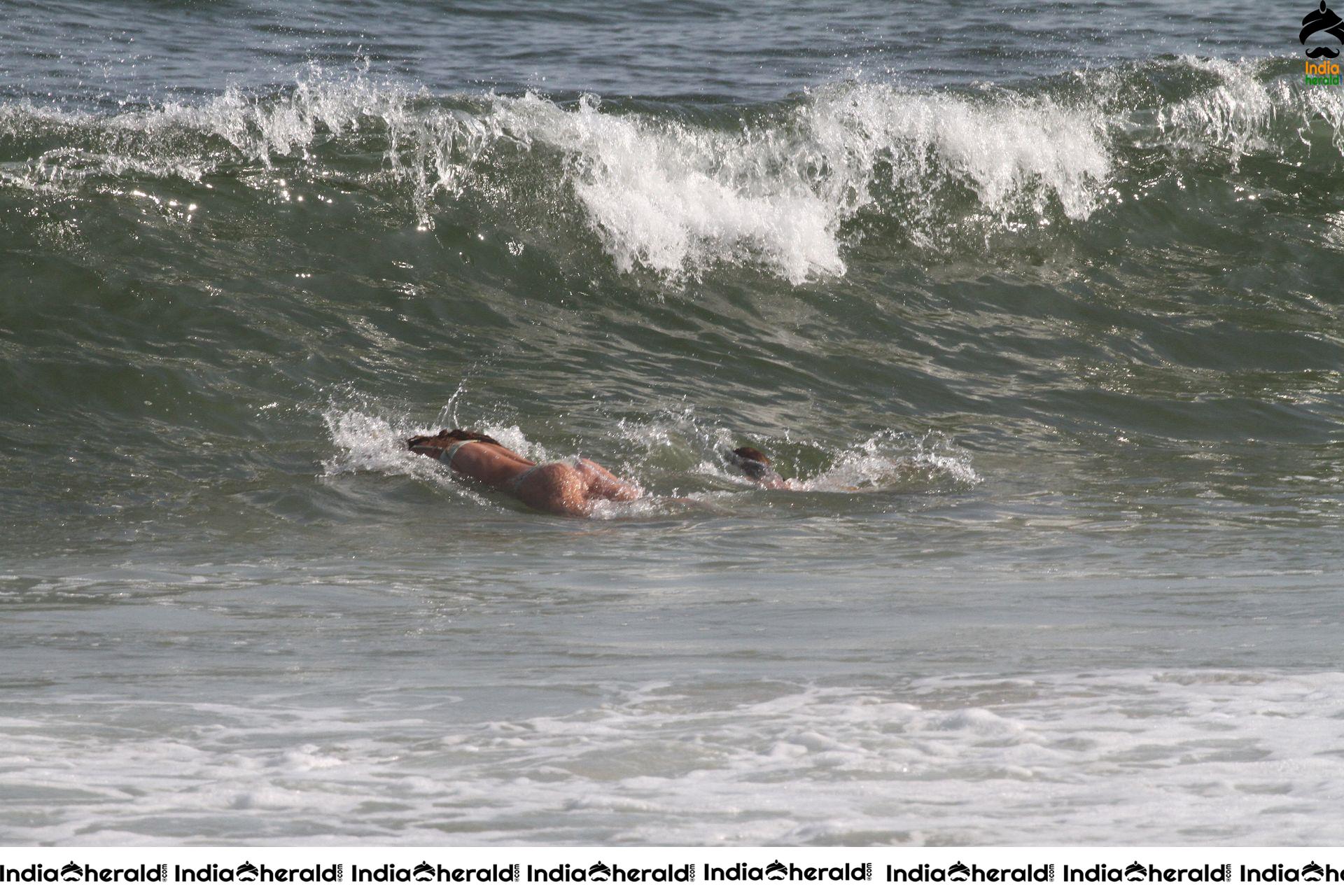 Nina Agdal enjoying in Beach at a beach in Hamptons