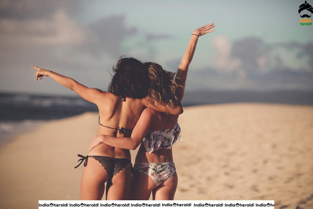 Nina Dobrev flaunts her sexy back in a Bikini