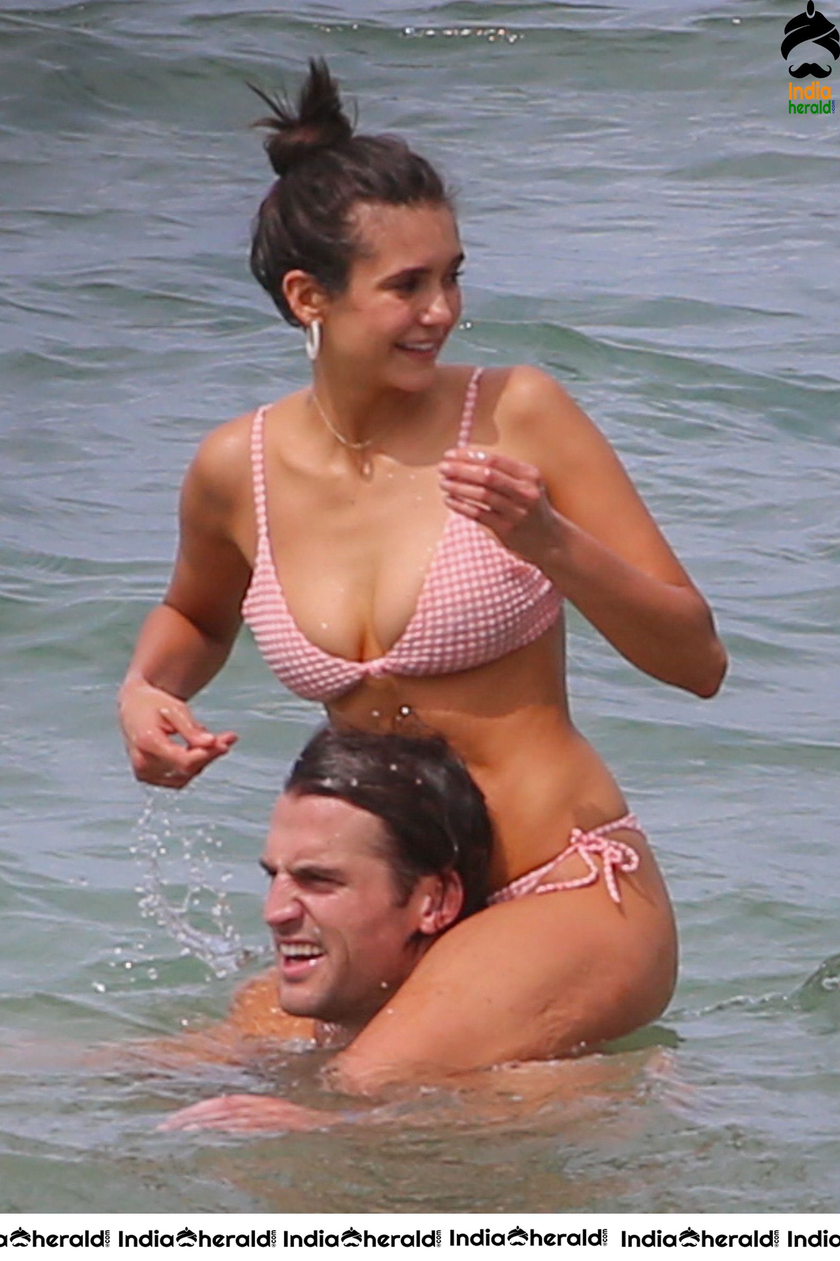 Nina Dobrev Hot Photos as she exposes Deep Cleavage and Midriff in Two Piece Bikini Set 1