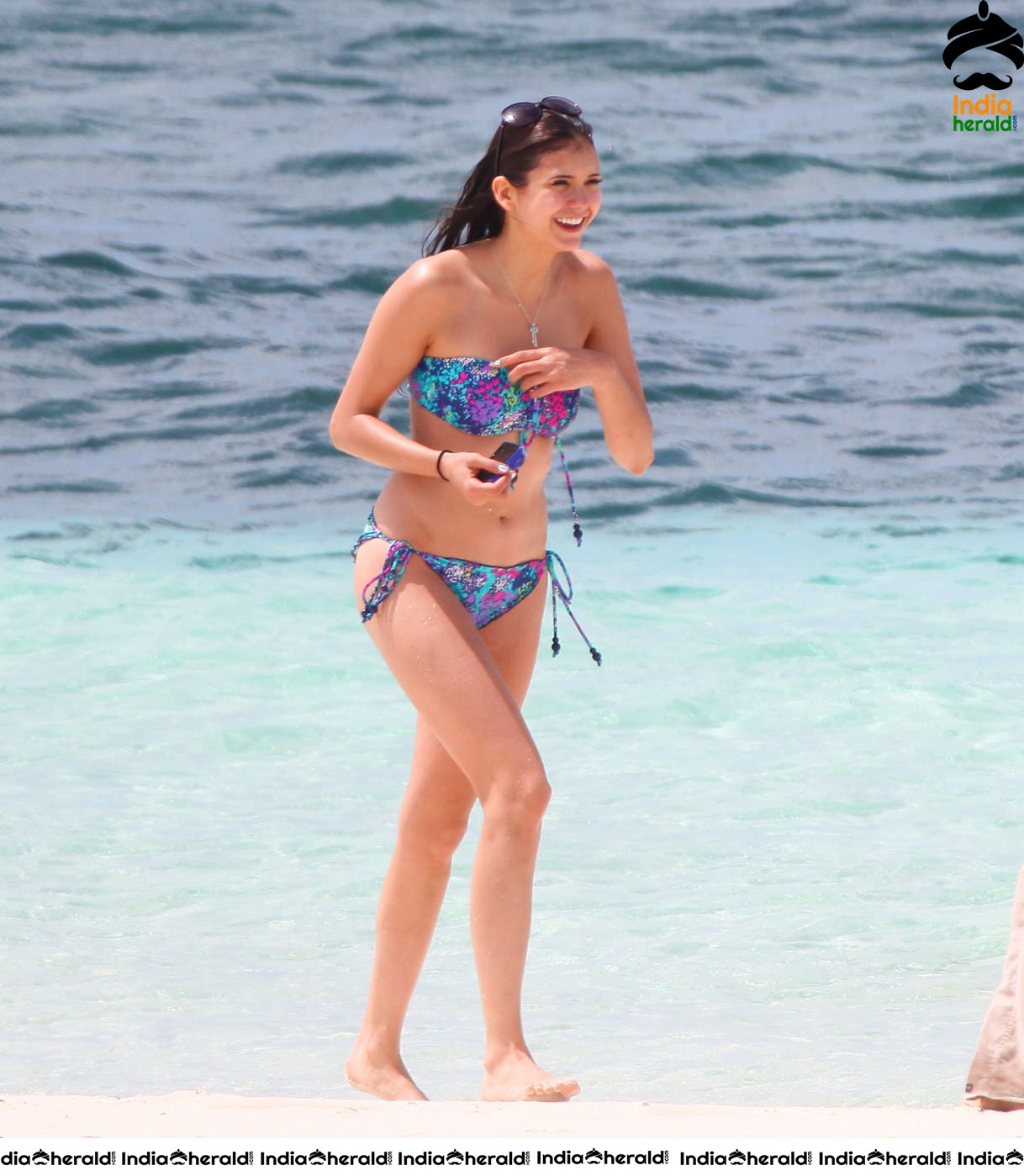 Nina Dobrev in Bikini at an Open Beach