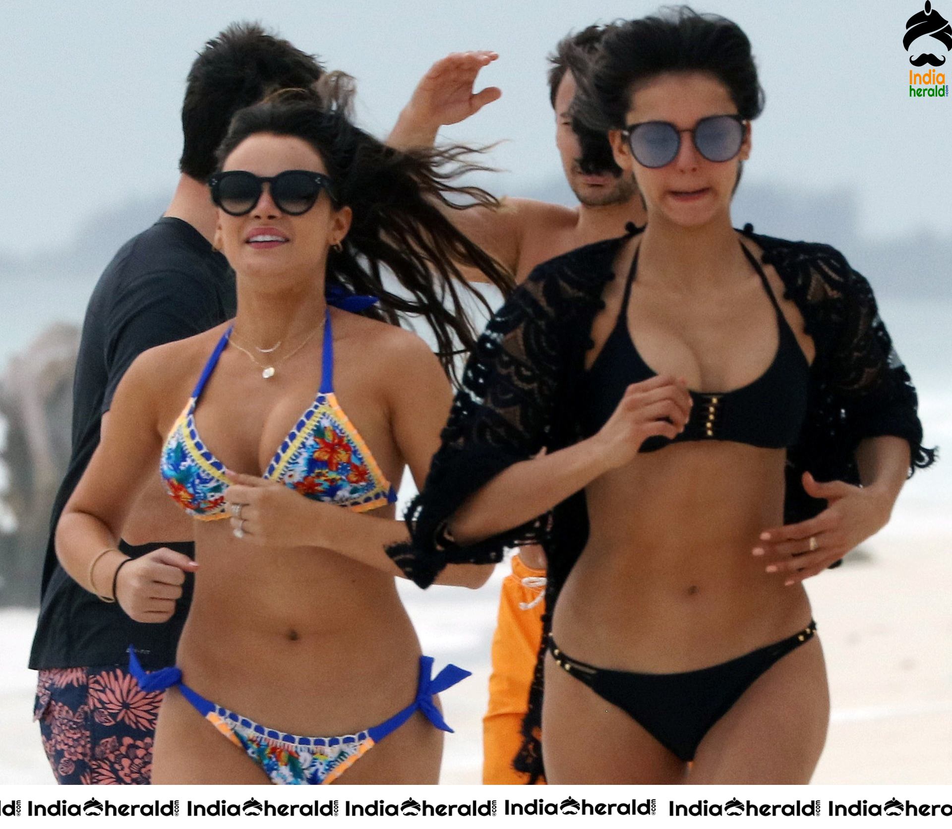 Nina Dobrev Wearing a Black Bikini and exposing her Tempting Body